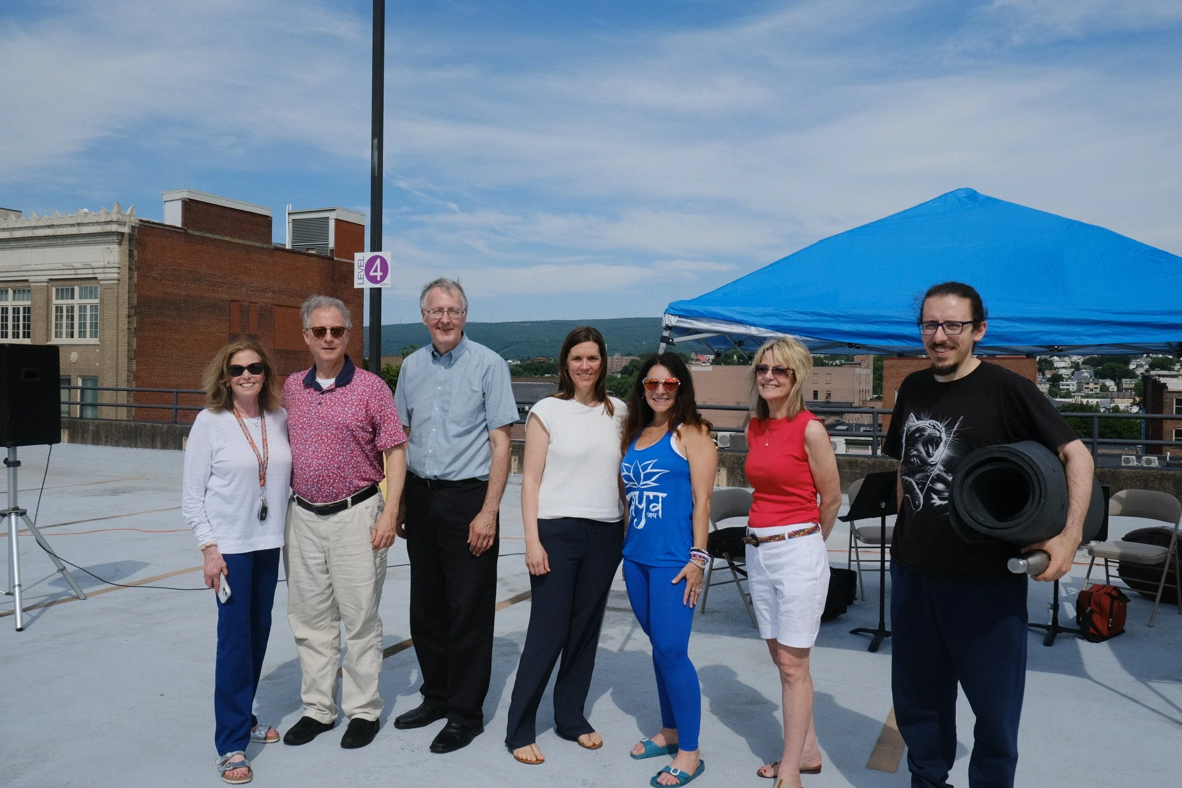 jaya-yoga-studio-hilary-carol-philharmonic-smiles-after-yoga-on-the-roof-scranton-2026.jpg
