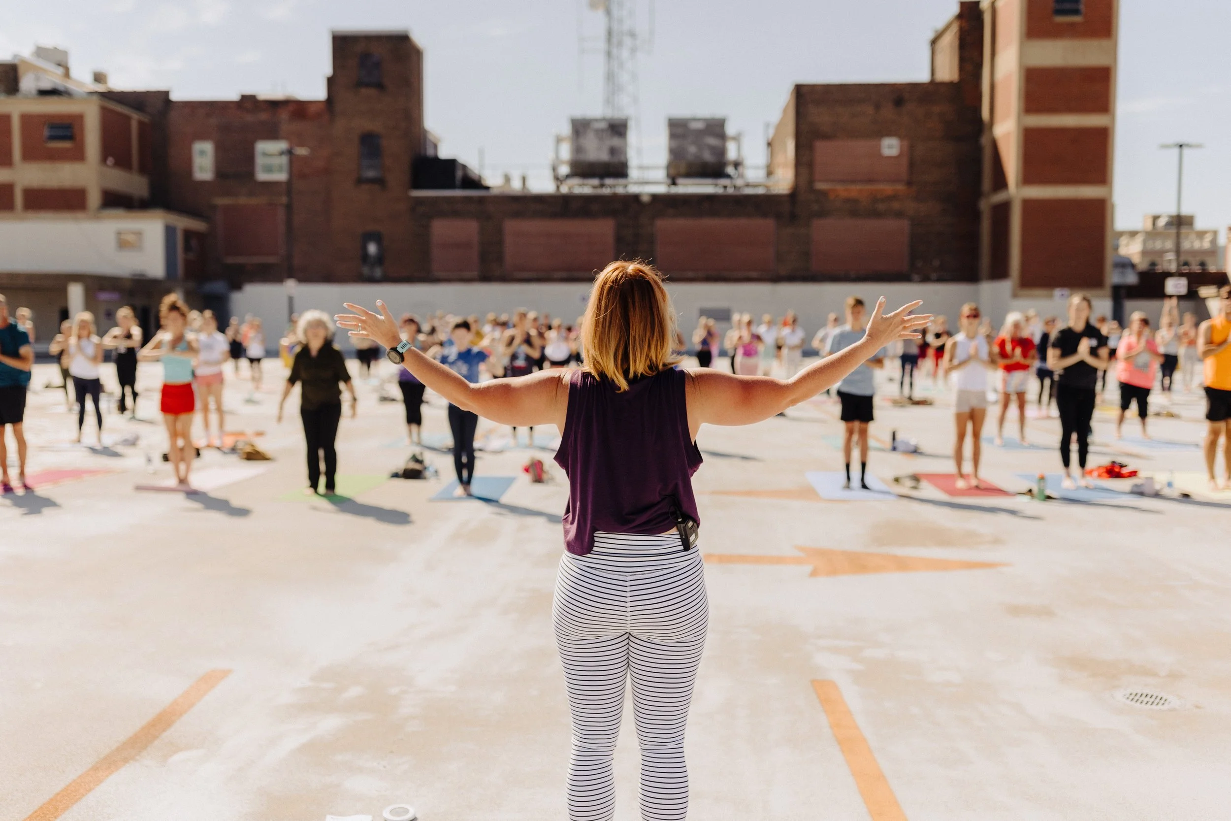 janelle-teaching-yoga-on-the-roof-marketplace-at-steamtown-jaya-yoga-studio-scranton-pa.jpg