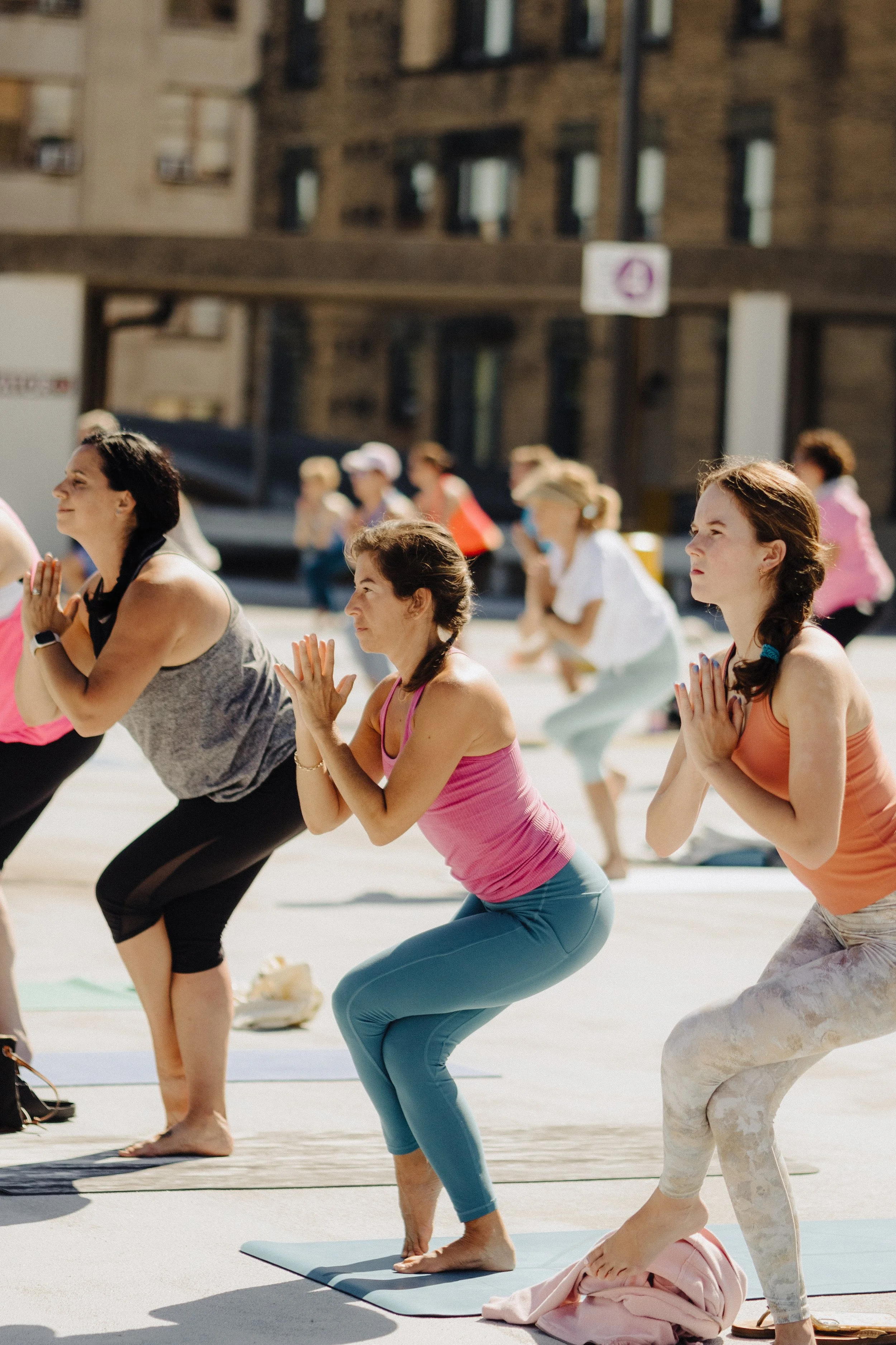 mom-and-daughter-eagle-legs-yoga-on-the-roof-jaya-yoga-studio-scranton-pa.jpg