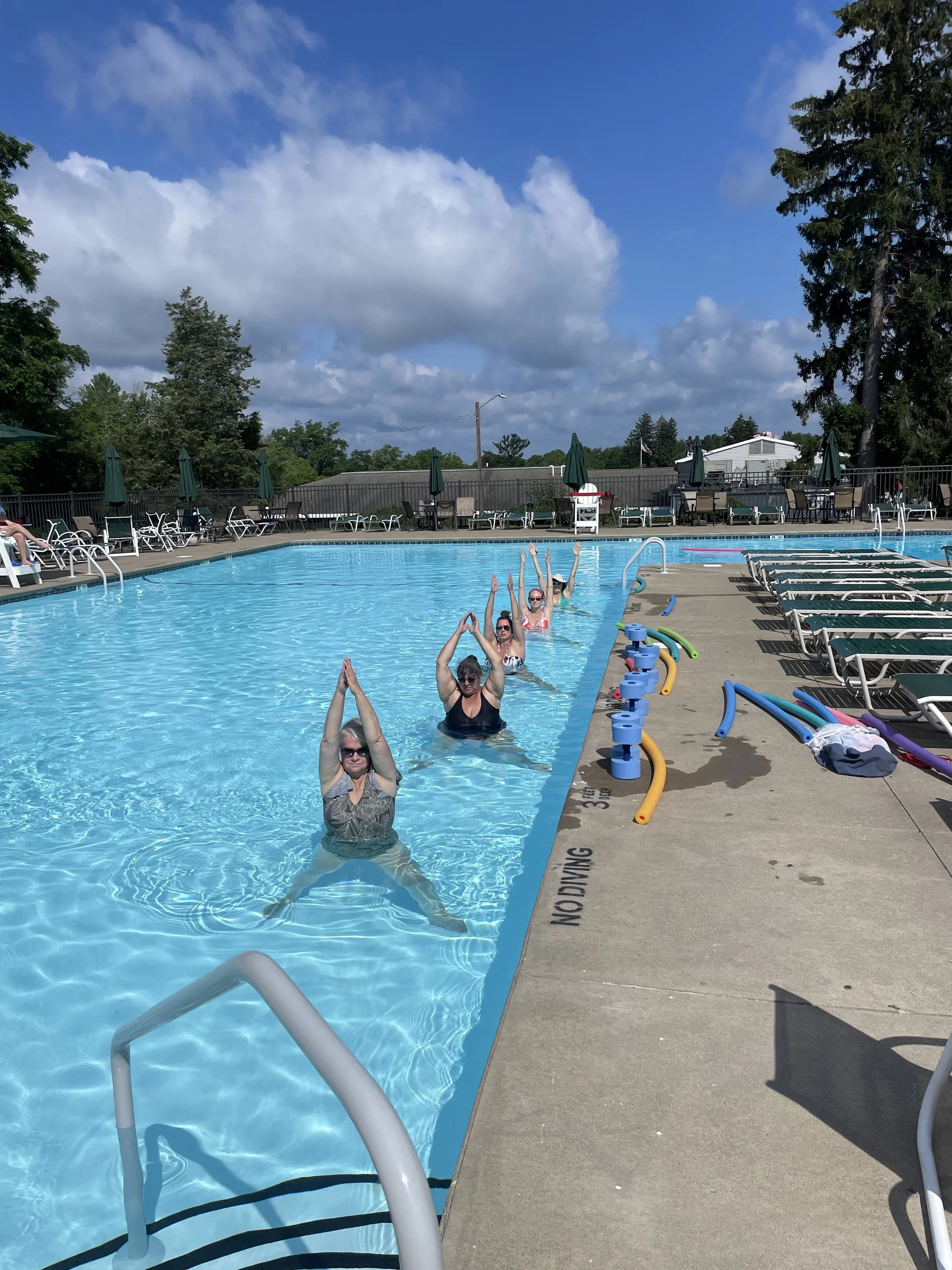 Outdoor Aqua Yoga session at Glen Oak Country Club pool in Clarks Summit, PA led by Jaya Yoga.