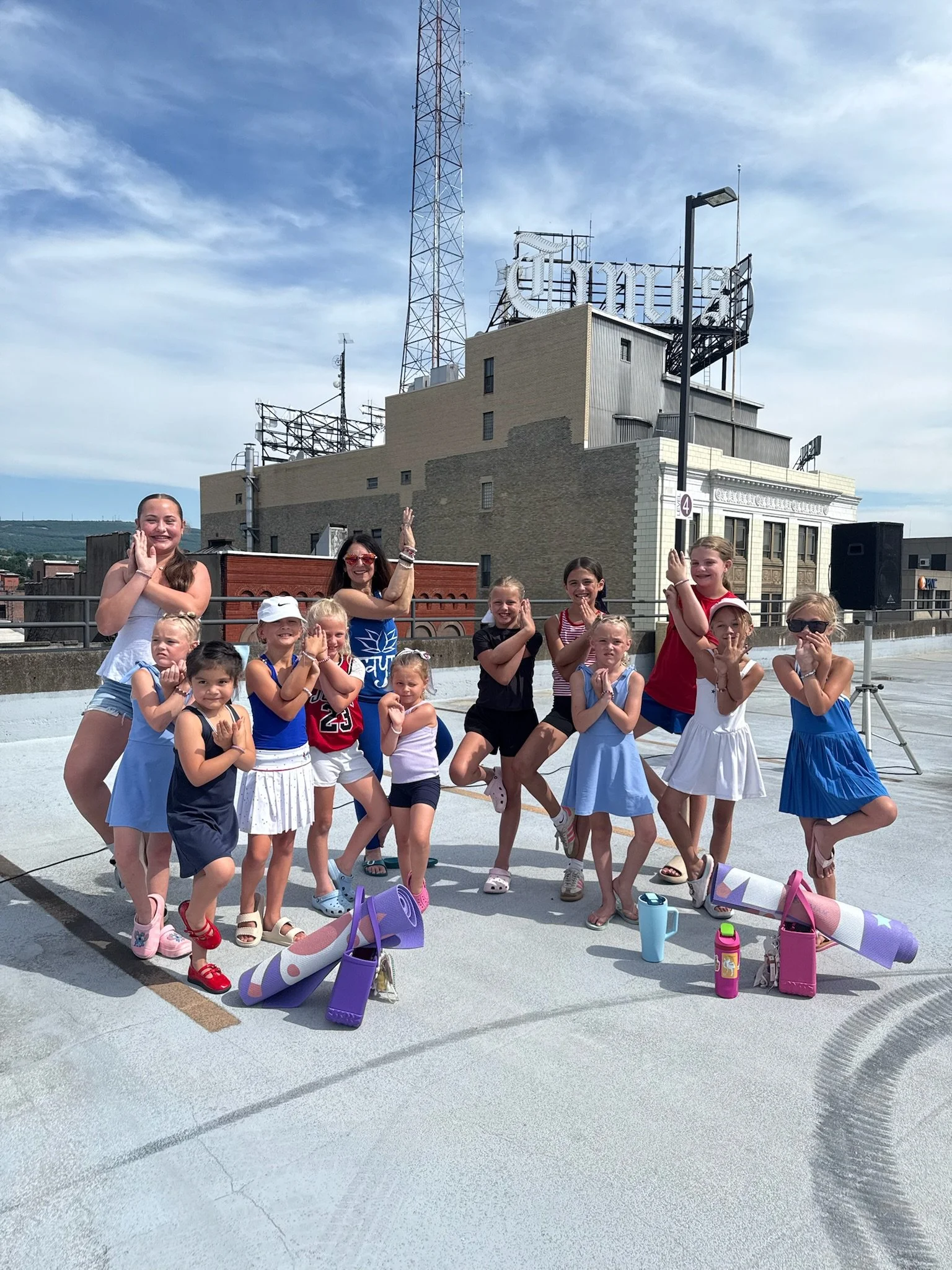 jaya-yoga-studio-kids-eagle-pose-yoga-on-the-roof-scranton-2026.jpg