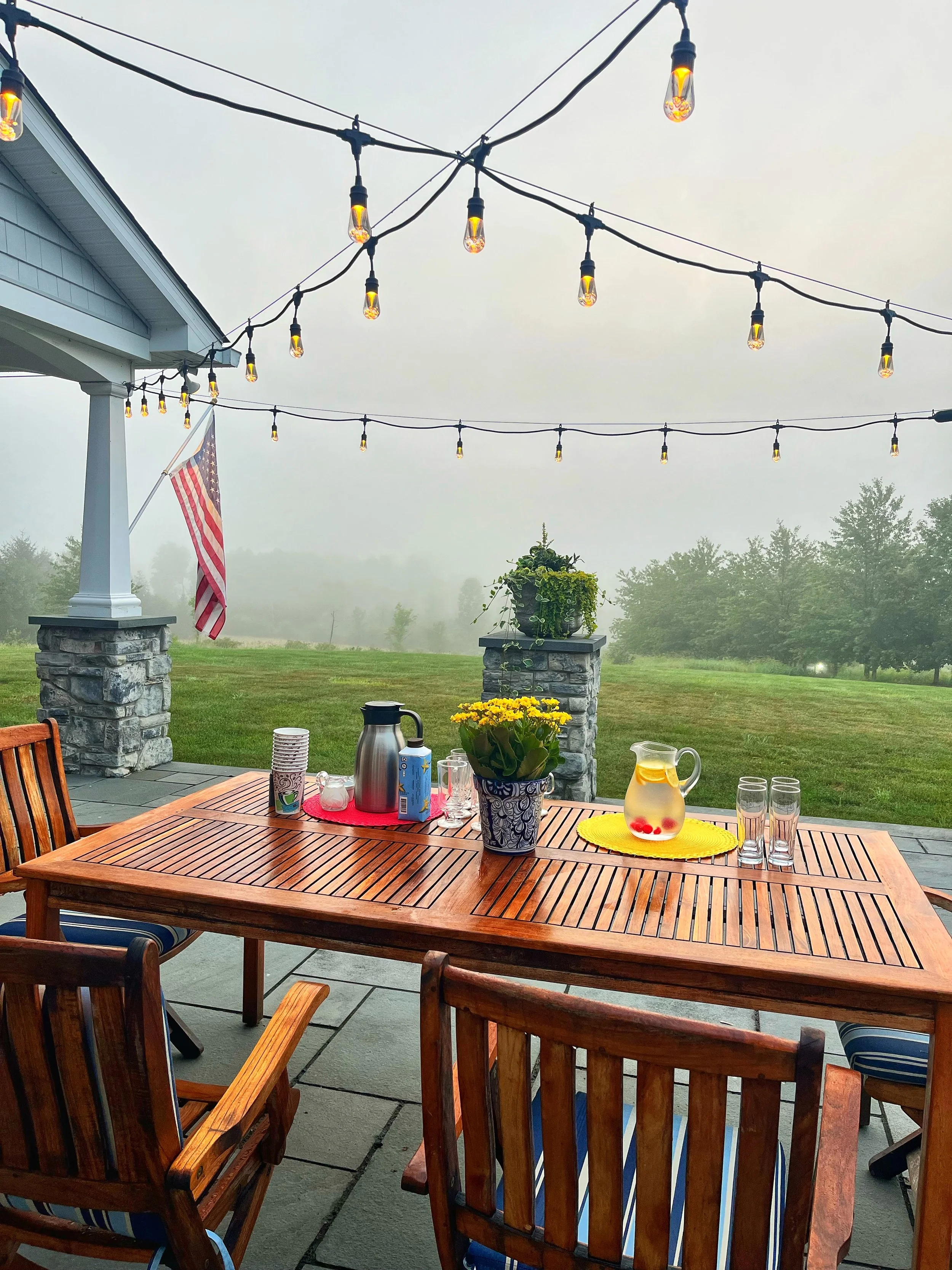 Coffee, fruit-infused water, and breakfast await the Jaya Yoga Studio Sunrise Crew after an outdoor morning yoga class.