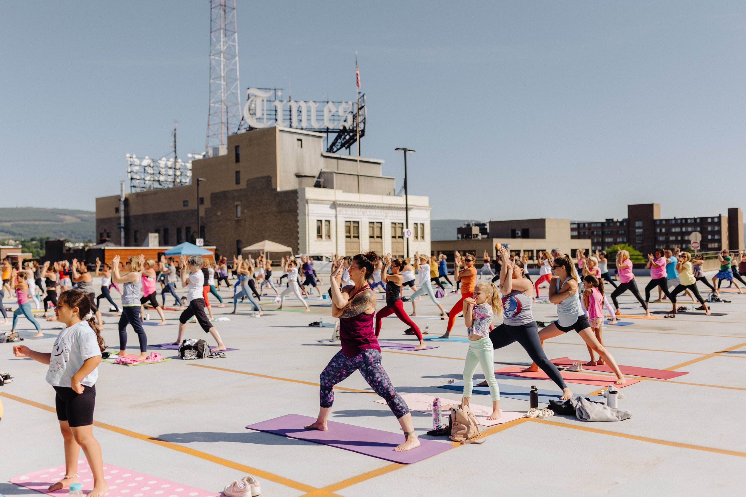 eagle-arms-warrior-jaya-yoga-on-the-roof-scranton-pa-july-4-community-yoga-event.jpg