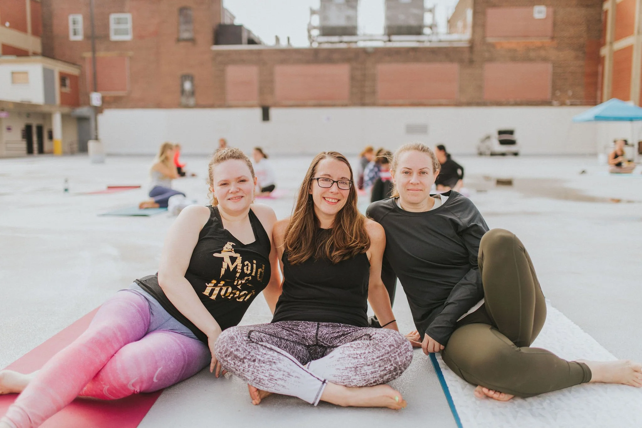 yoga-on-the-roof-2021-before-class-smiling-participants.jpg