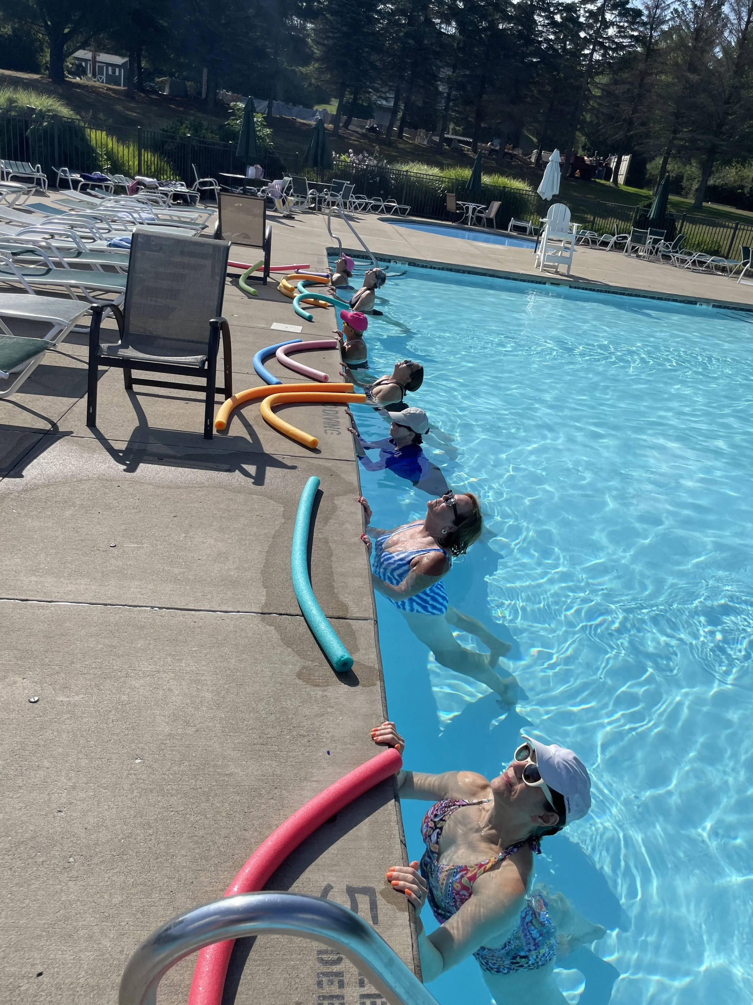 Group Aqua Yoga class in the pool at Glen Oak Country Club in Clarks Summit, Pennsylvania.