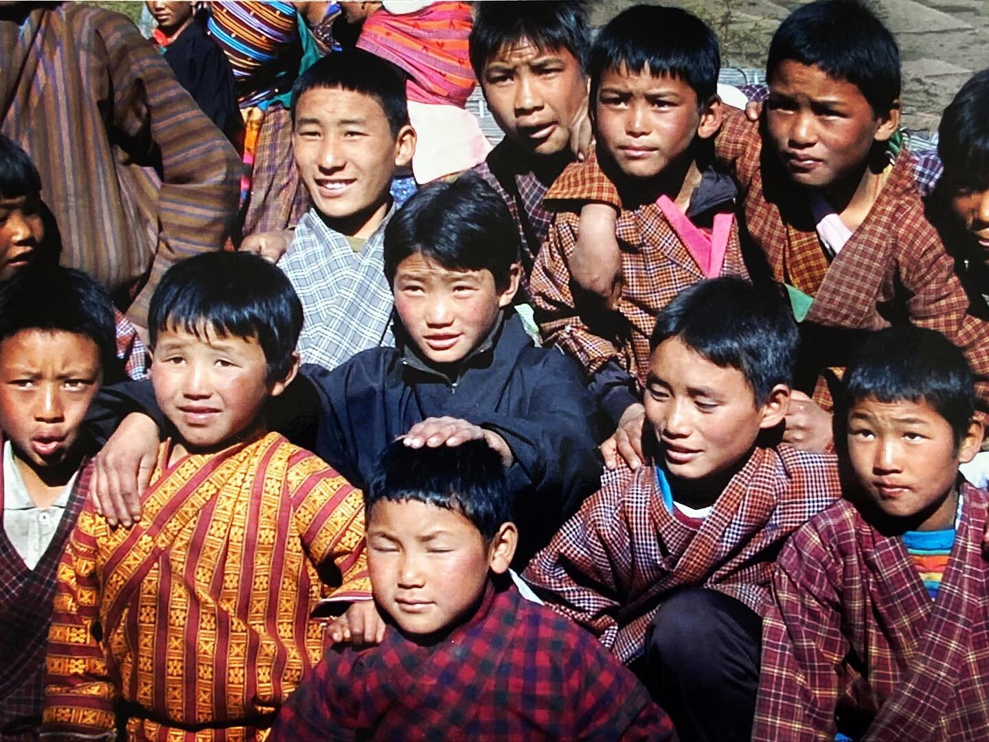 Young boys of Nga Lhakang, watching the masked dances at the annual Tsechu.