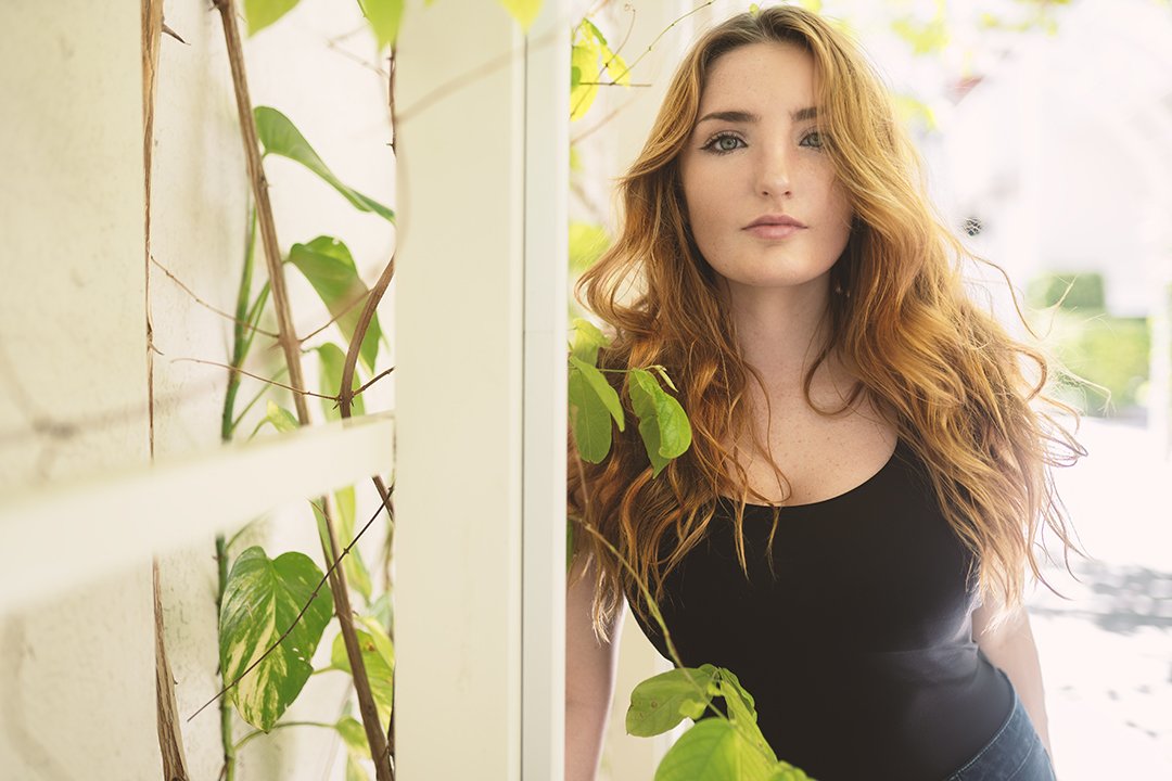 Close-up of a young redhead woman.