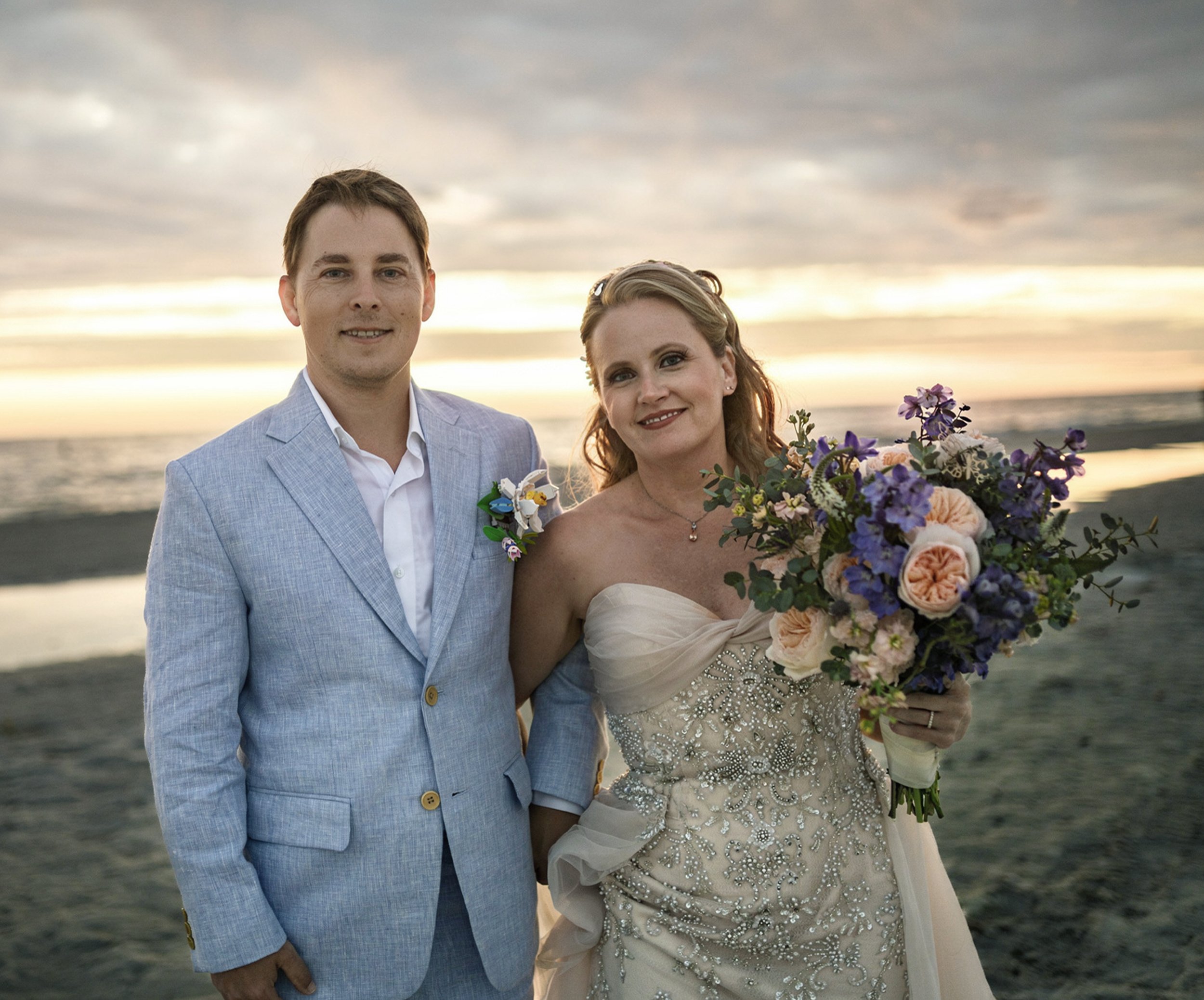 Bride and groom beach wedding.