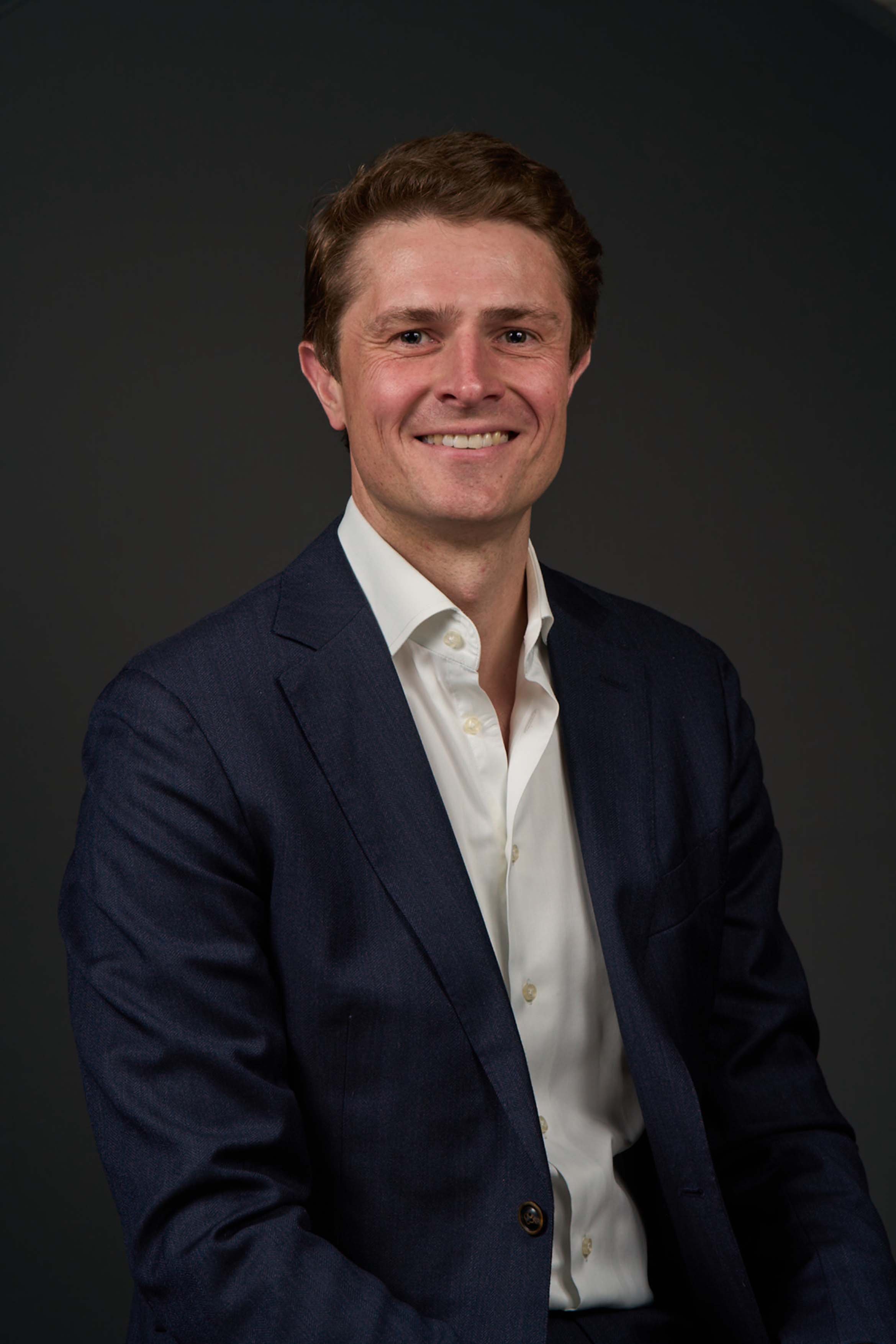 Headshot photo of a business man.
