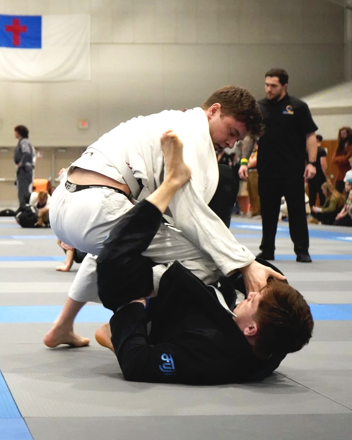 Athletes grappling during FUJI Jiu-Jitsu tournament match