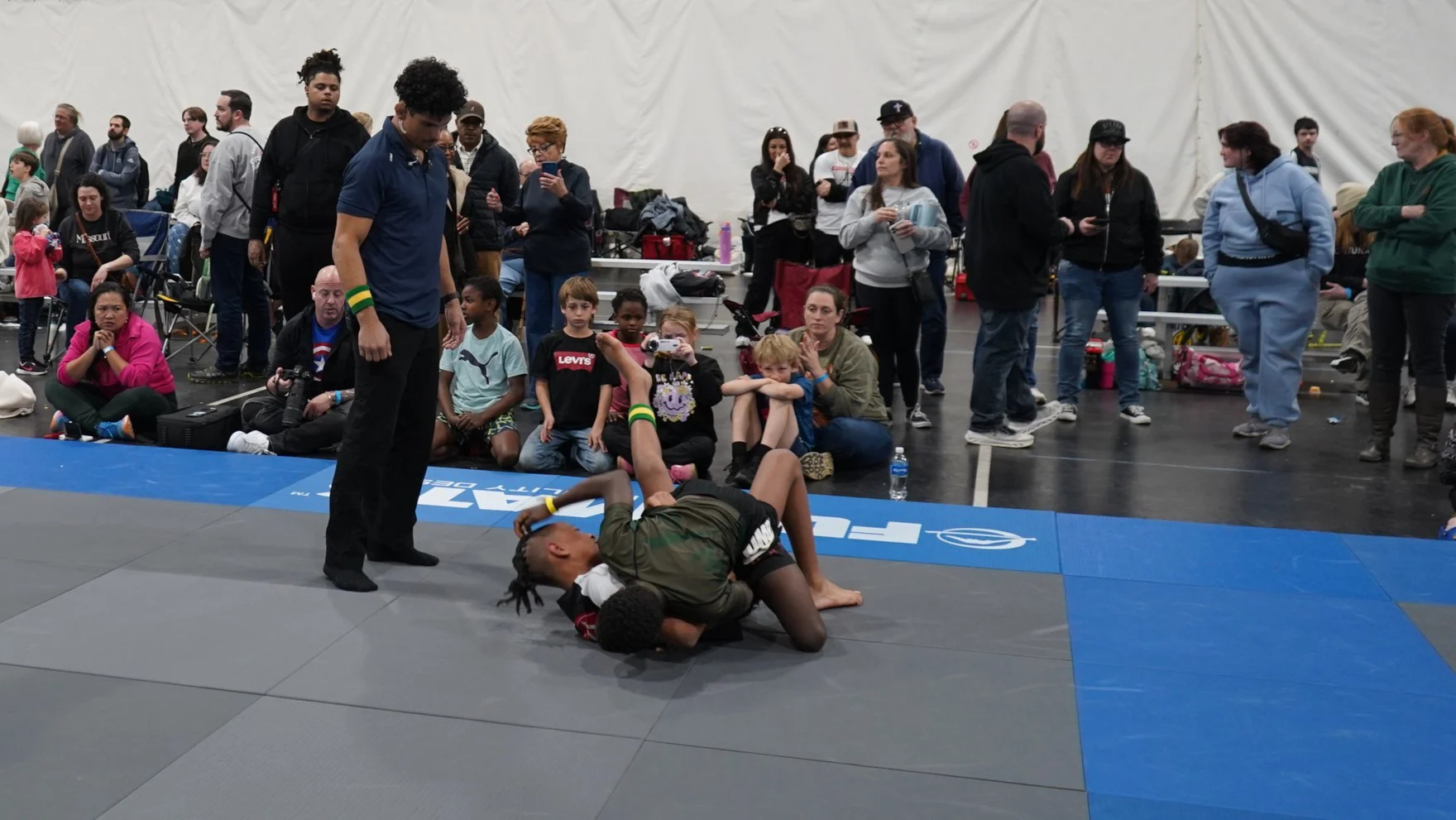 Jiu-jitsu athletes sparring