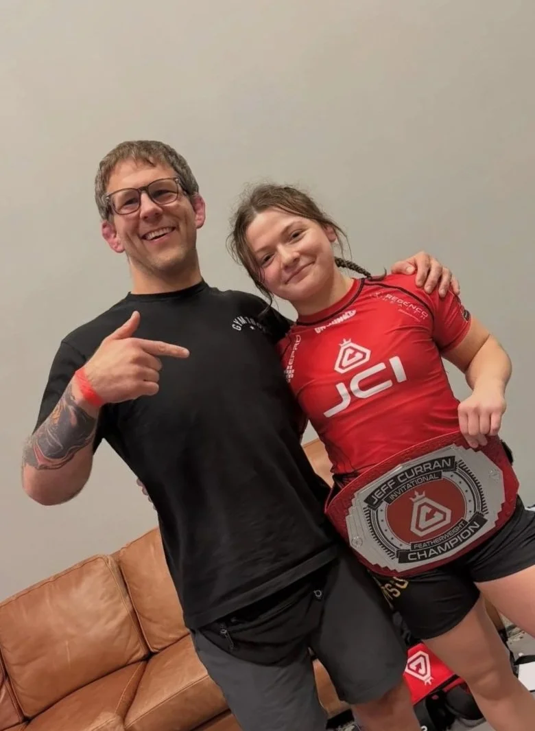 Camila Estrada takes the Jeff Curran Invitational Featherweight Title by Woj Lock