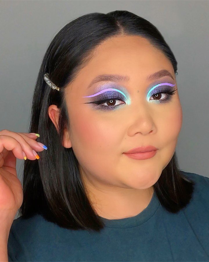 girl with neon blue and purple eyeshadow.jpg