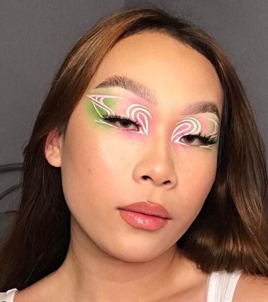 girl with graphic pink and green eyeshadow.jpg