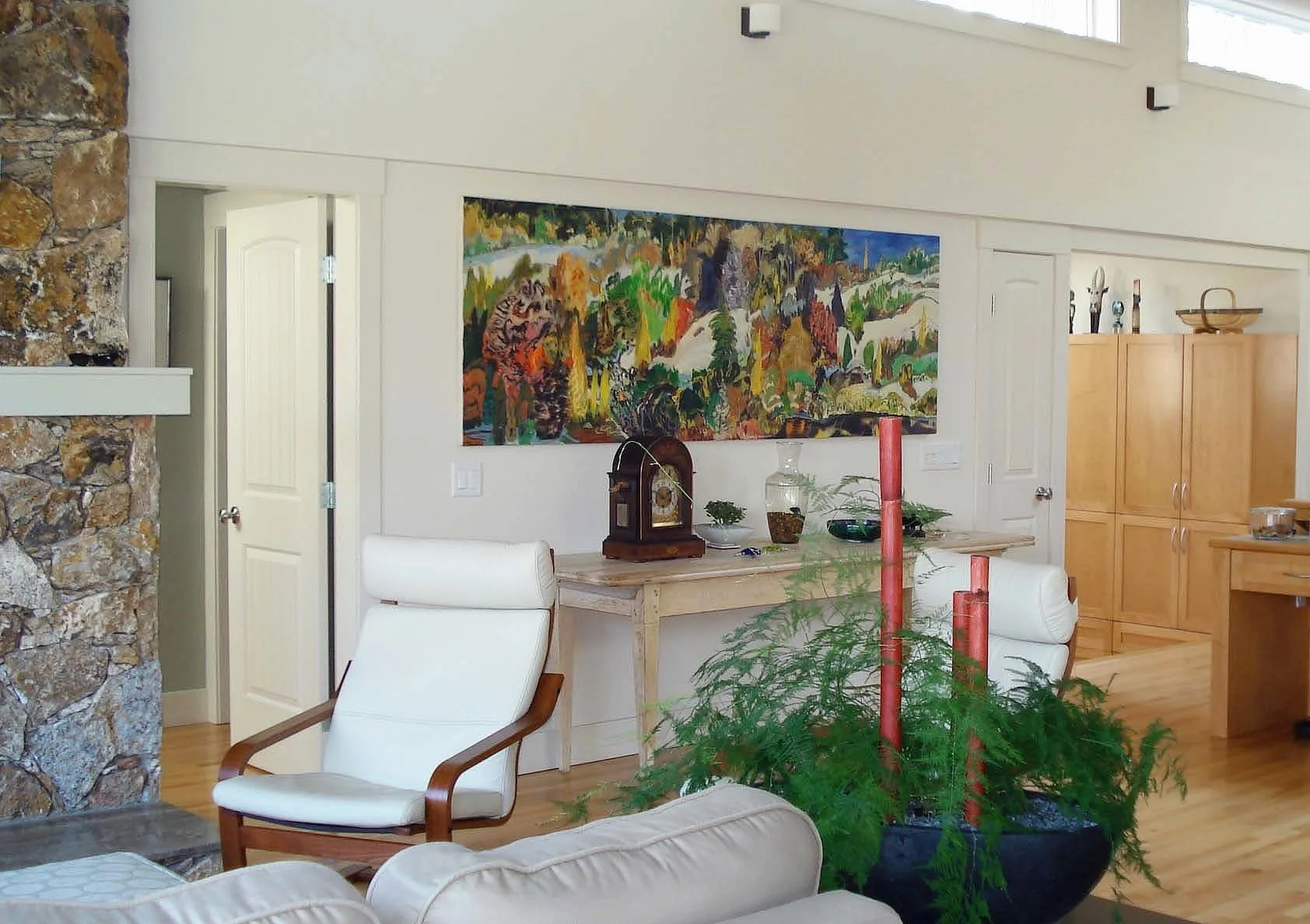 Interior of living room painted white with stone fireplace | Farrow and Ball Paints Lime White | White Rock BC | K Colour Design
