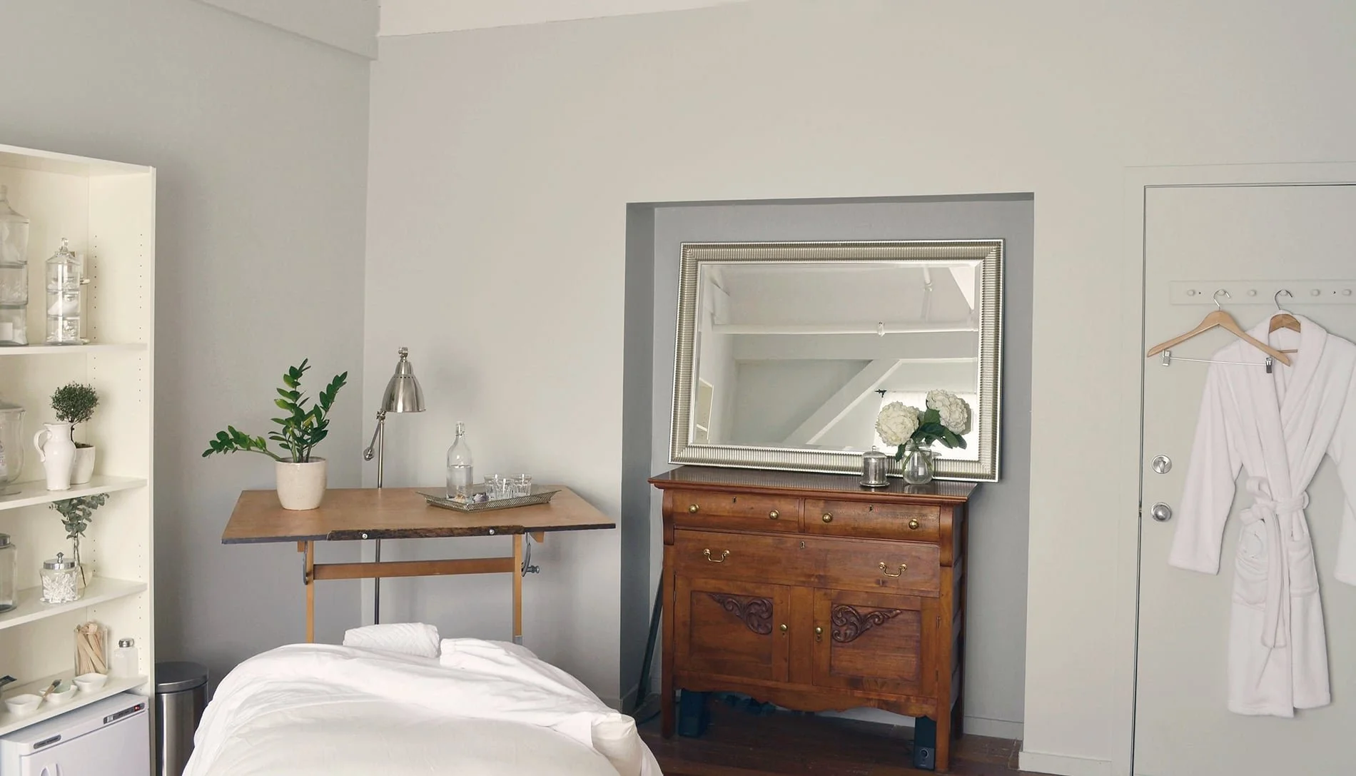 K Colour by Kora Sevier | Vancouver based paint colour and design consultant | Interior of spa treatment room with grey walls and furniture | Benjamin Moore paints Gray Owl