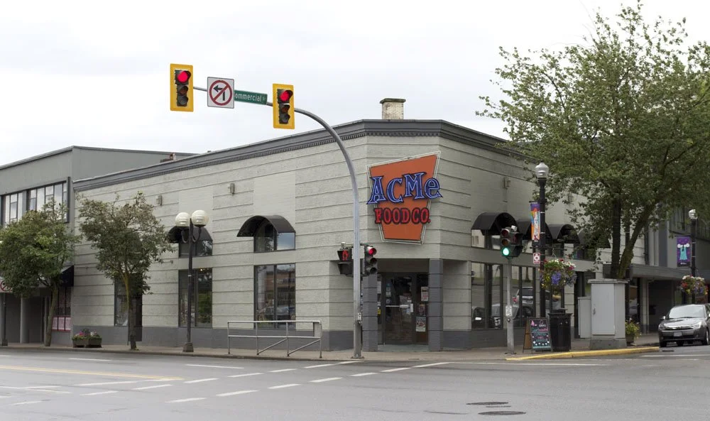 Exterior of commercial building painted in green | Jean Burns Building Nanaimo BC | K Colour Design