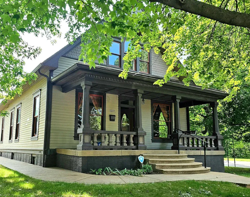 Front view of craftsman style home from early 1900's