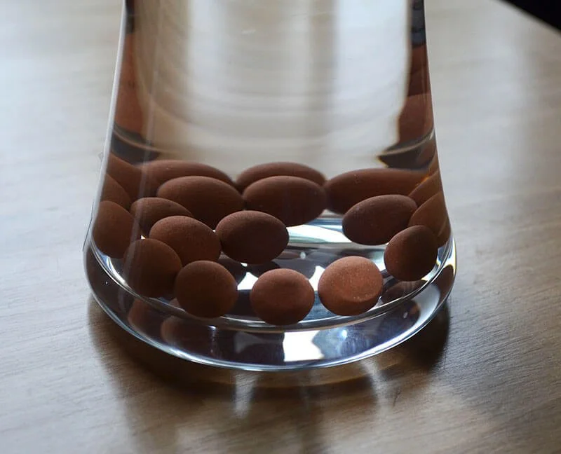 Ceramic balls in carafe of water