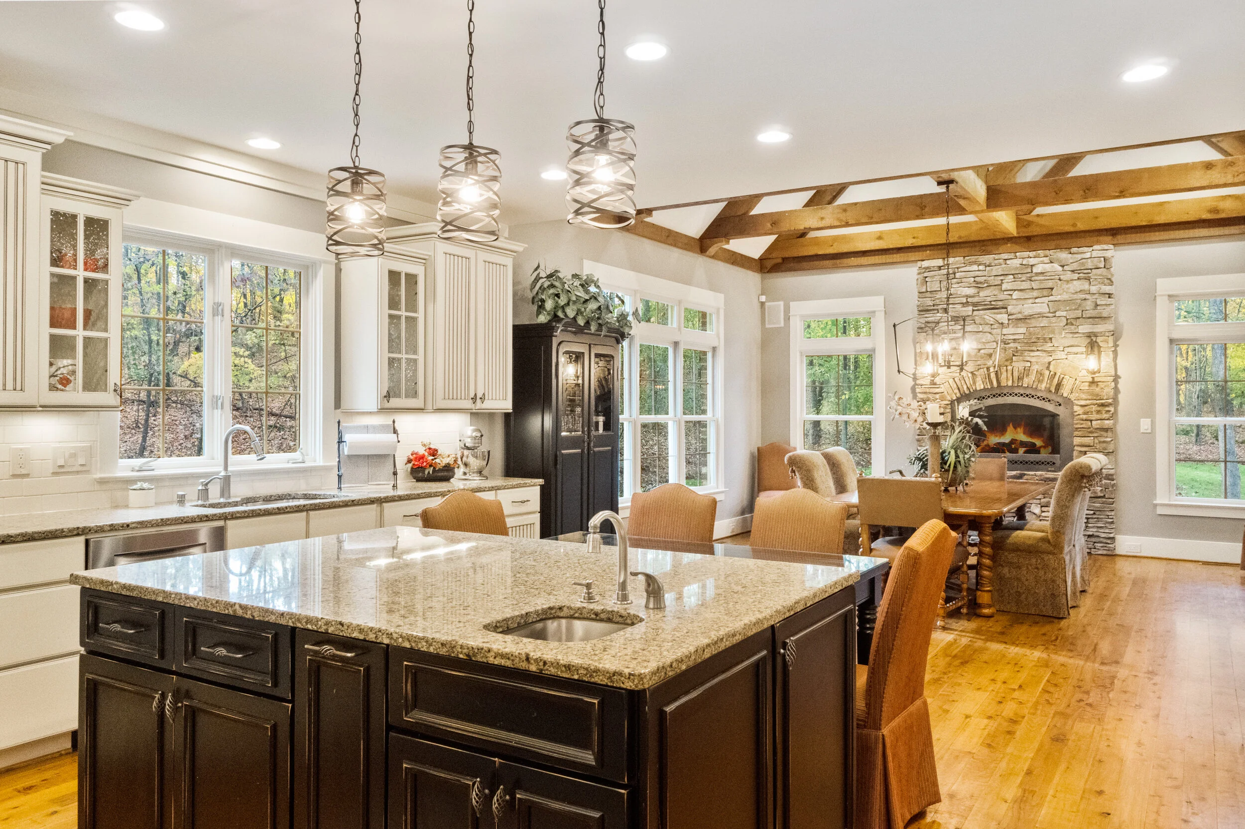 Open living and dining area with kitchen island and TV in tampa metro