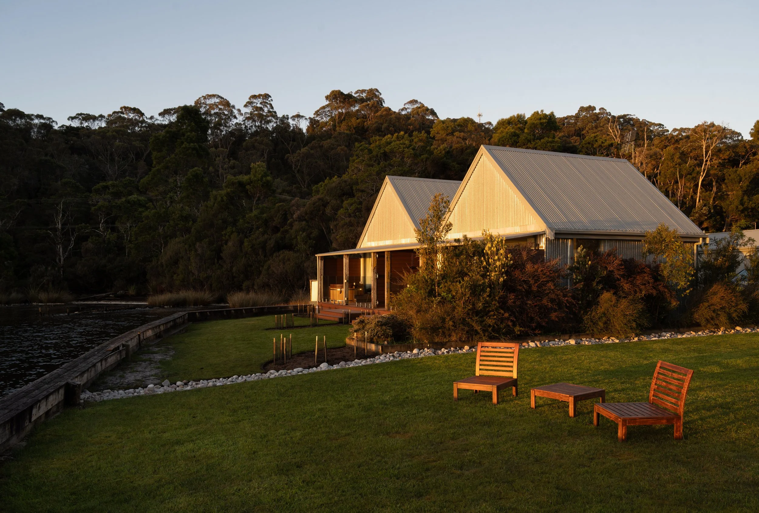 The waterfront Cove Pavilions and lawns at sunset.jpeg