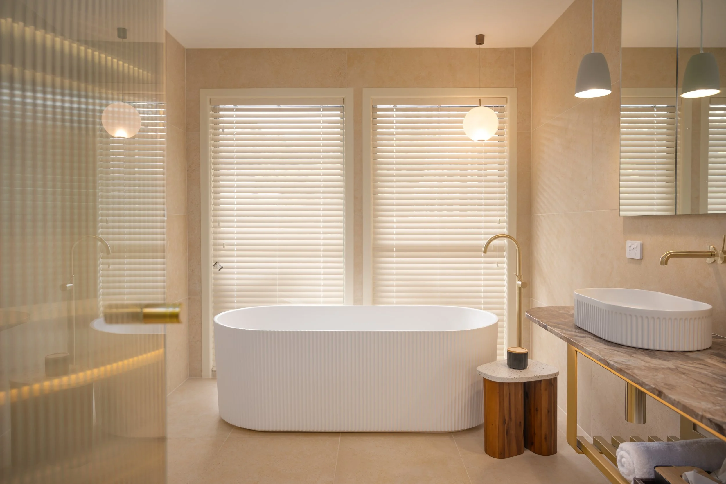 Storyteller's Suite - Luxurious ensuite bathroom with oversized fluted bath.jpg