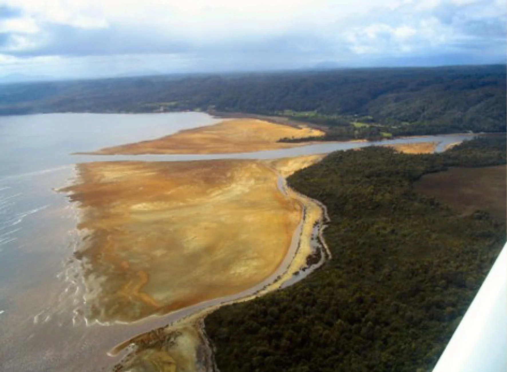 The King River delta and surrounding land where the river meets Macquarie Harbour and toxic waste from mining washed down the river accumulated.