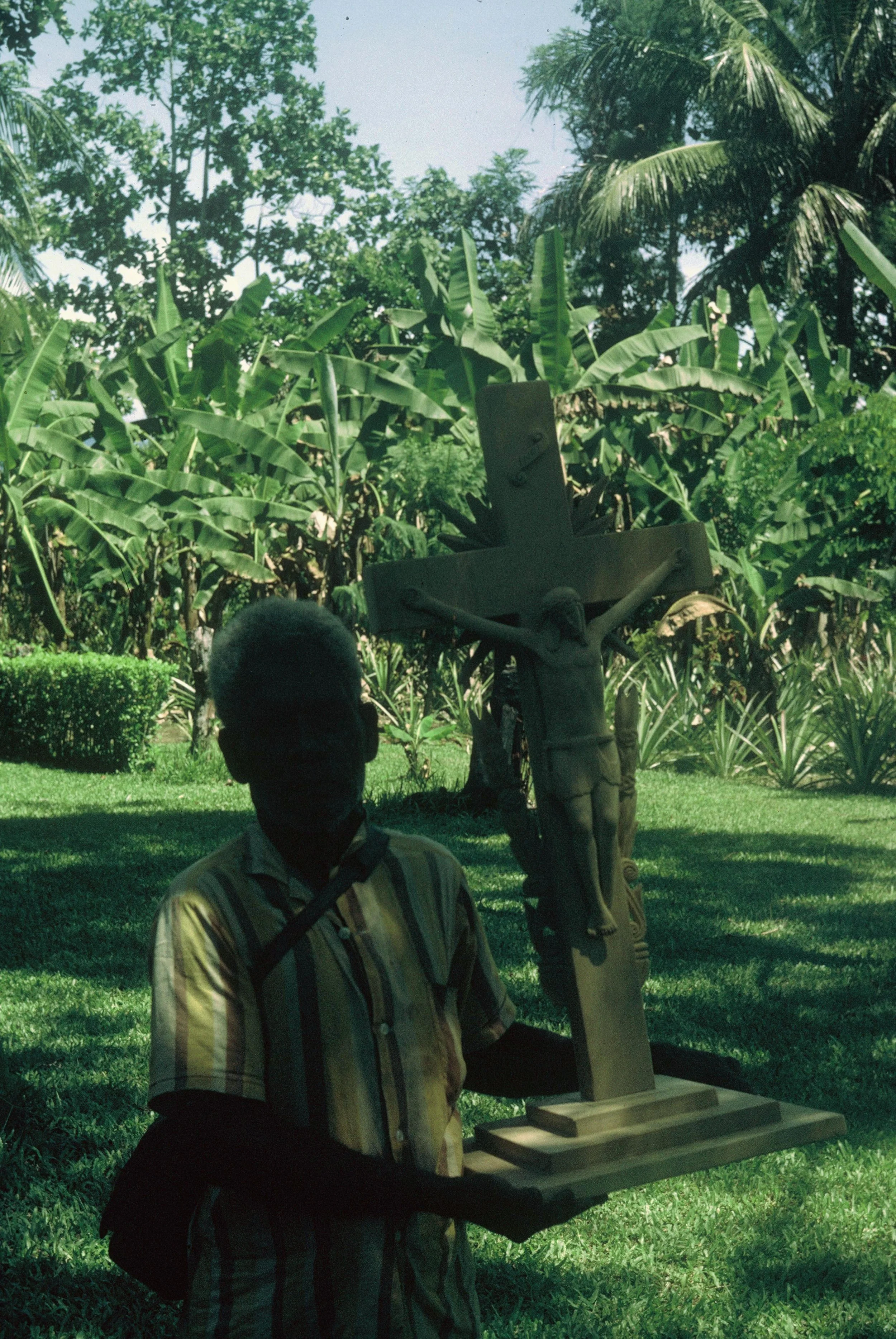 Hoboic the carver of this large Crucifex from Buakap. Crucifex was set on the alter of the Malalo church..jpg