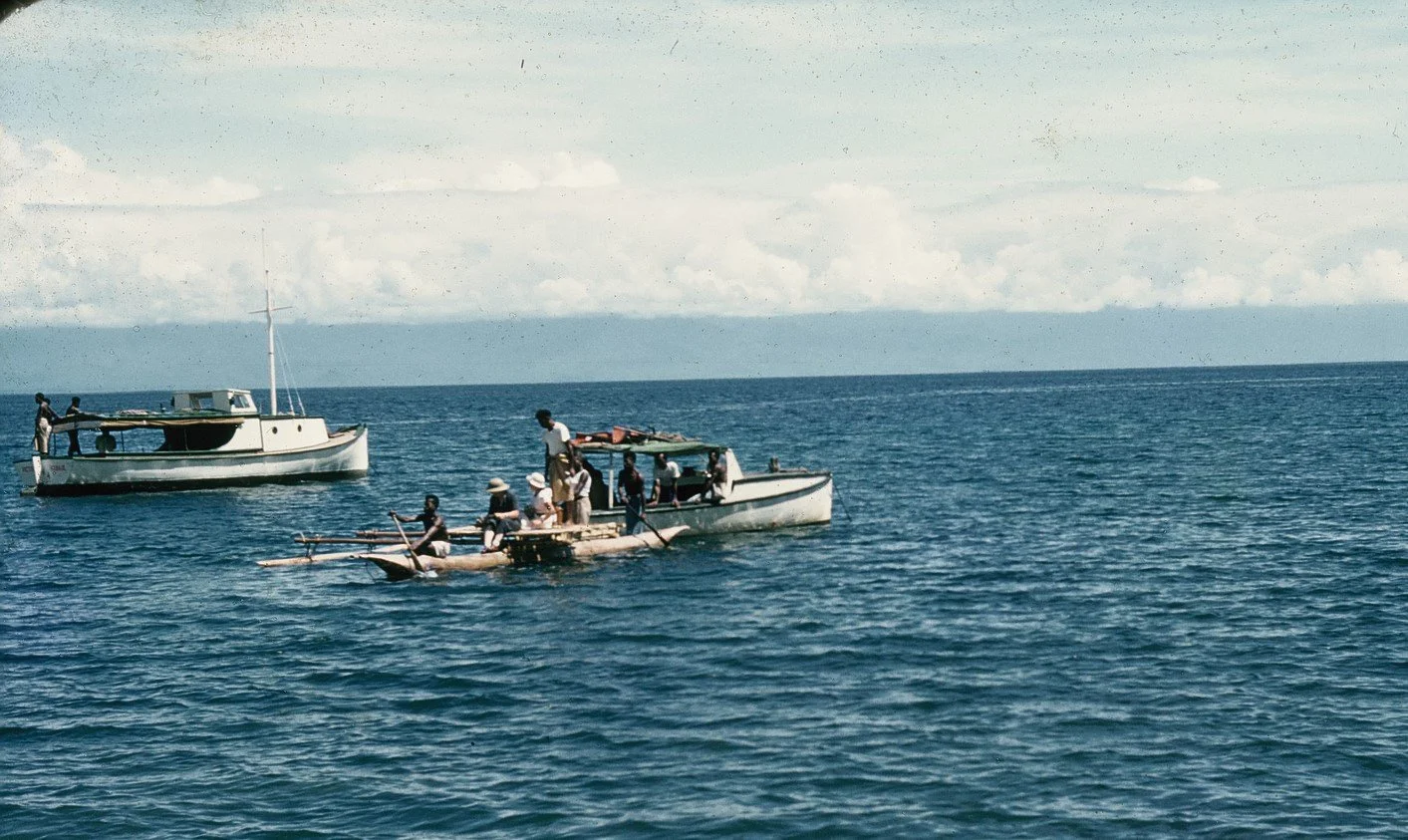 Kuli in foreground, Victor in background with no people, looking from Malalo towards Lae but too foggy to see mountains behind Lae..jpg