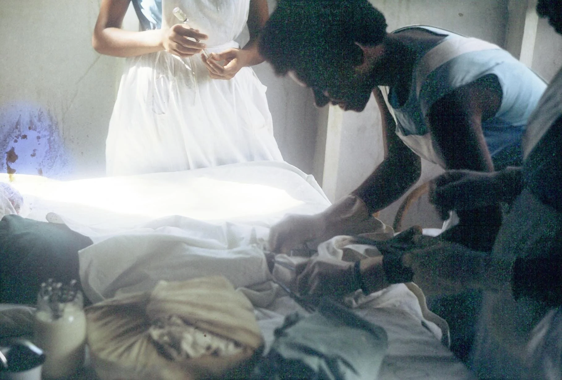 Dispensery NursesFixingWound.jpg