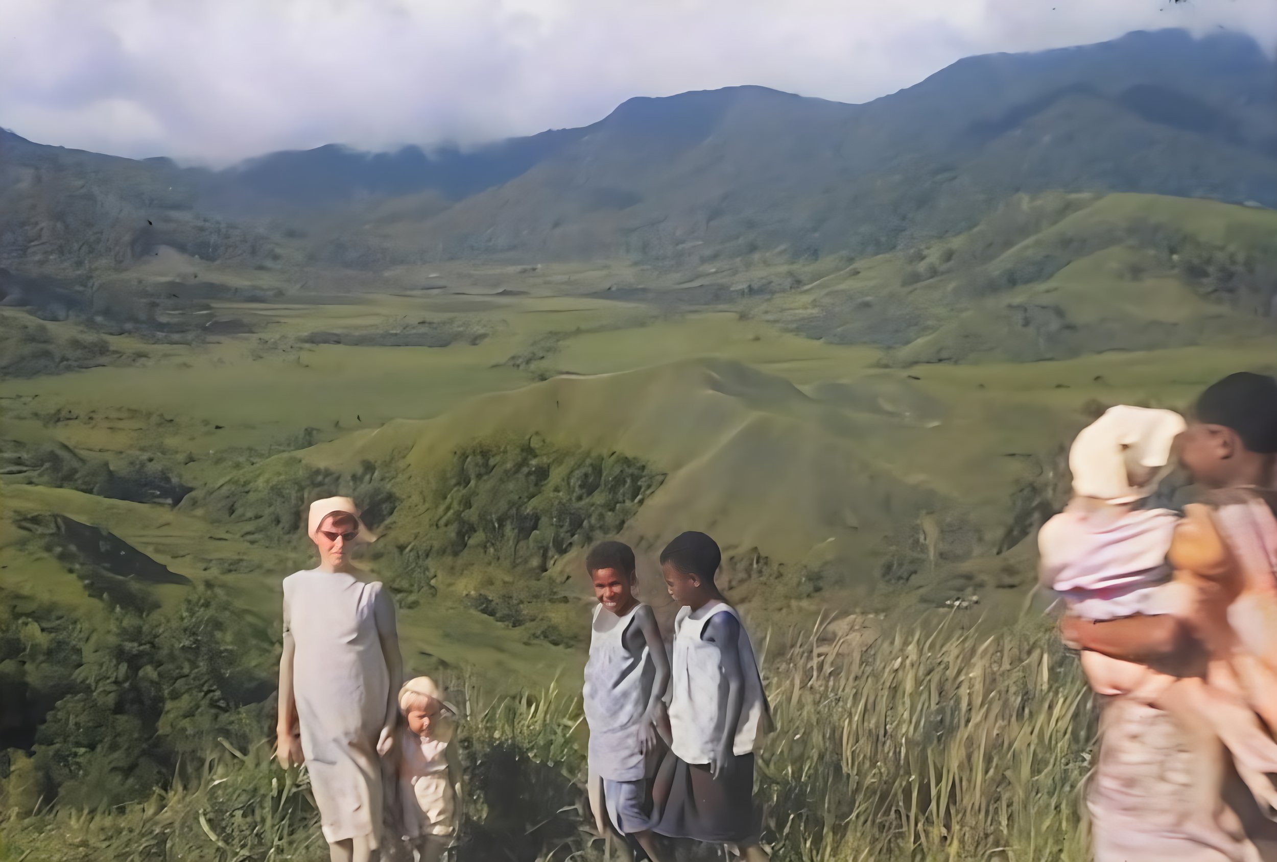 1963 May Buangs with Paula, Tom being carried.jpg