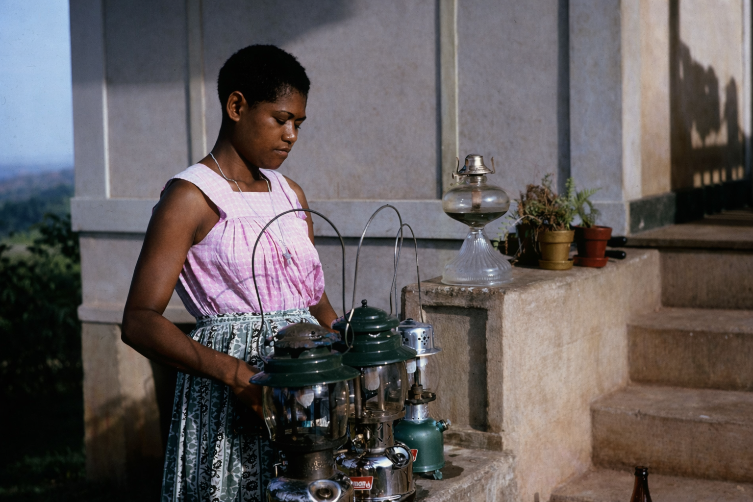 Malolo front steps cleaning and oiiling Lamps.jpg