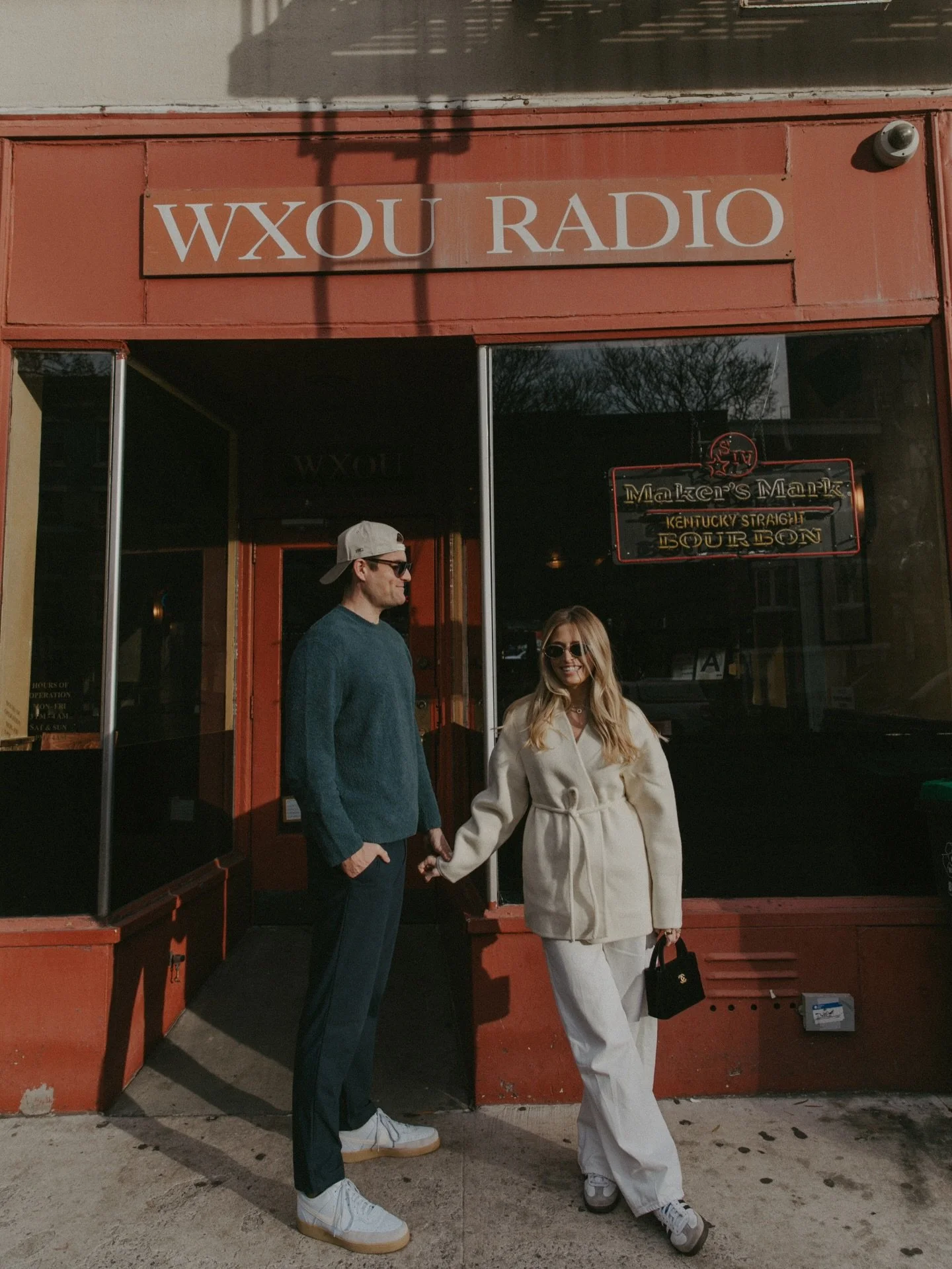 Hugs + kisses in the village with Liz + Andrew.