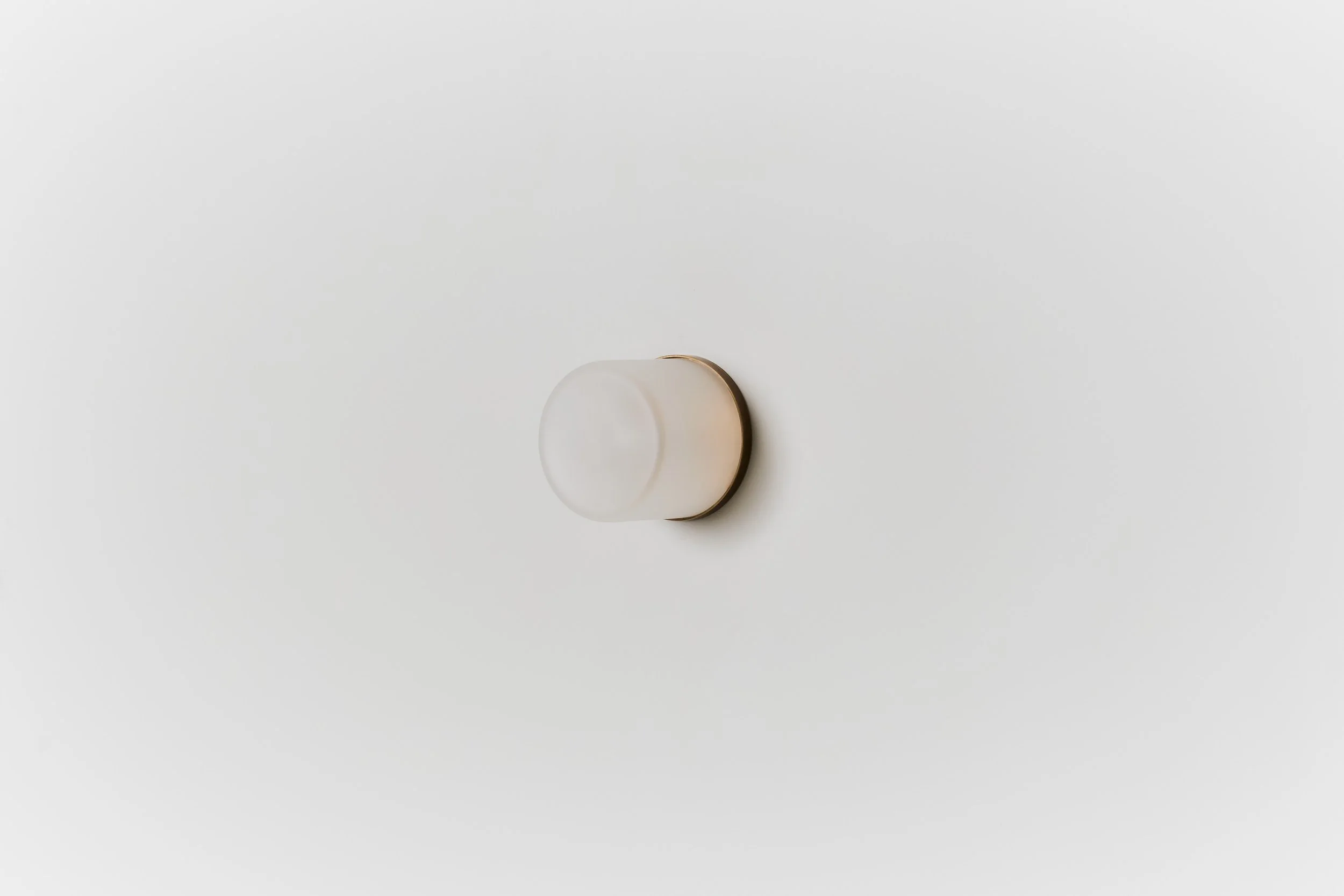 Rider_Nude Large_Aged Brass_Brut Clear Frosted_Side_Off.jpg