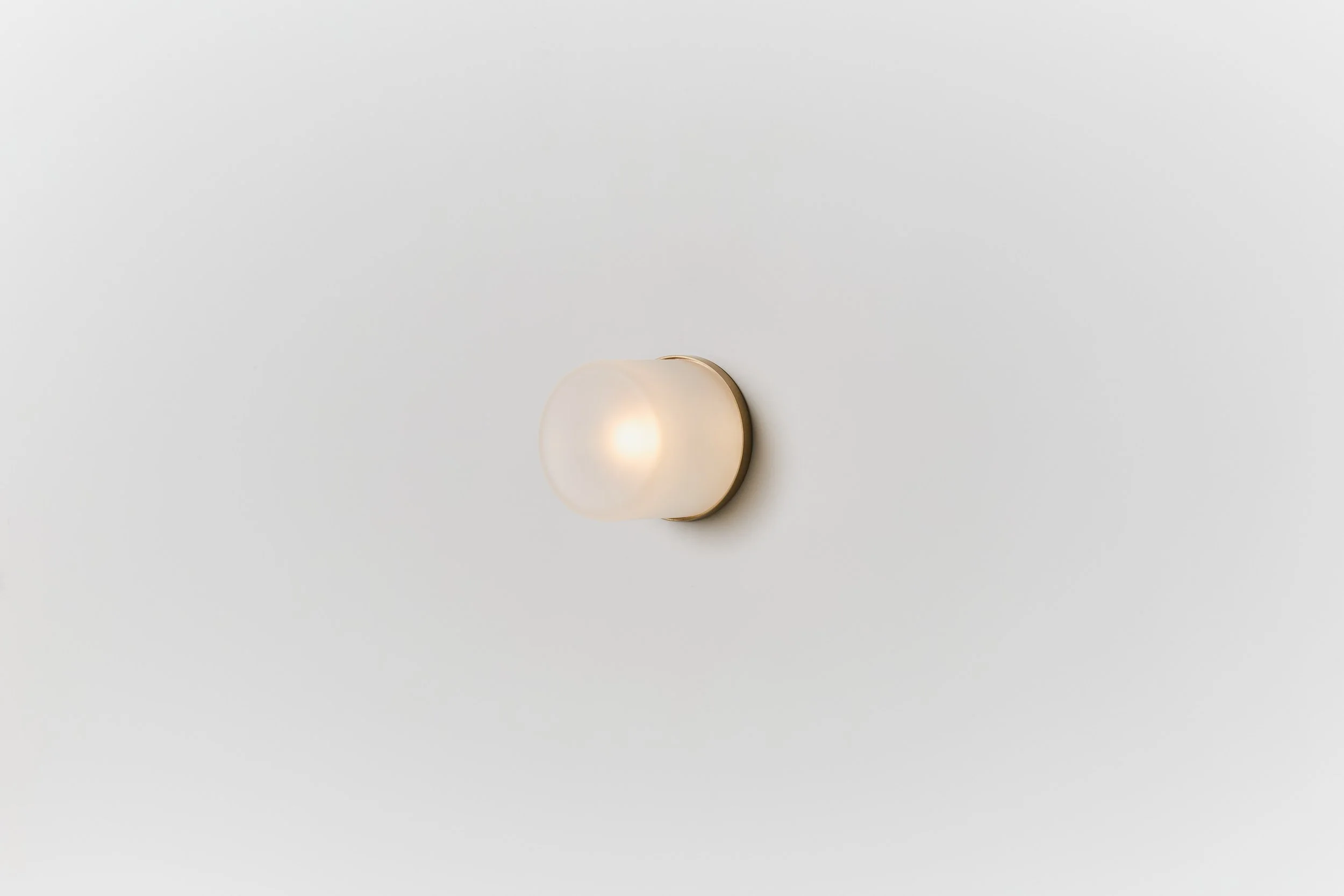 Rider_Nude Large_Hand-Brushed Brass_Brut Clear Frosted_Side_On.jpg