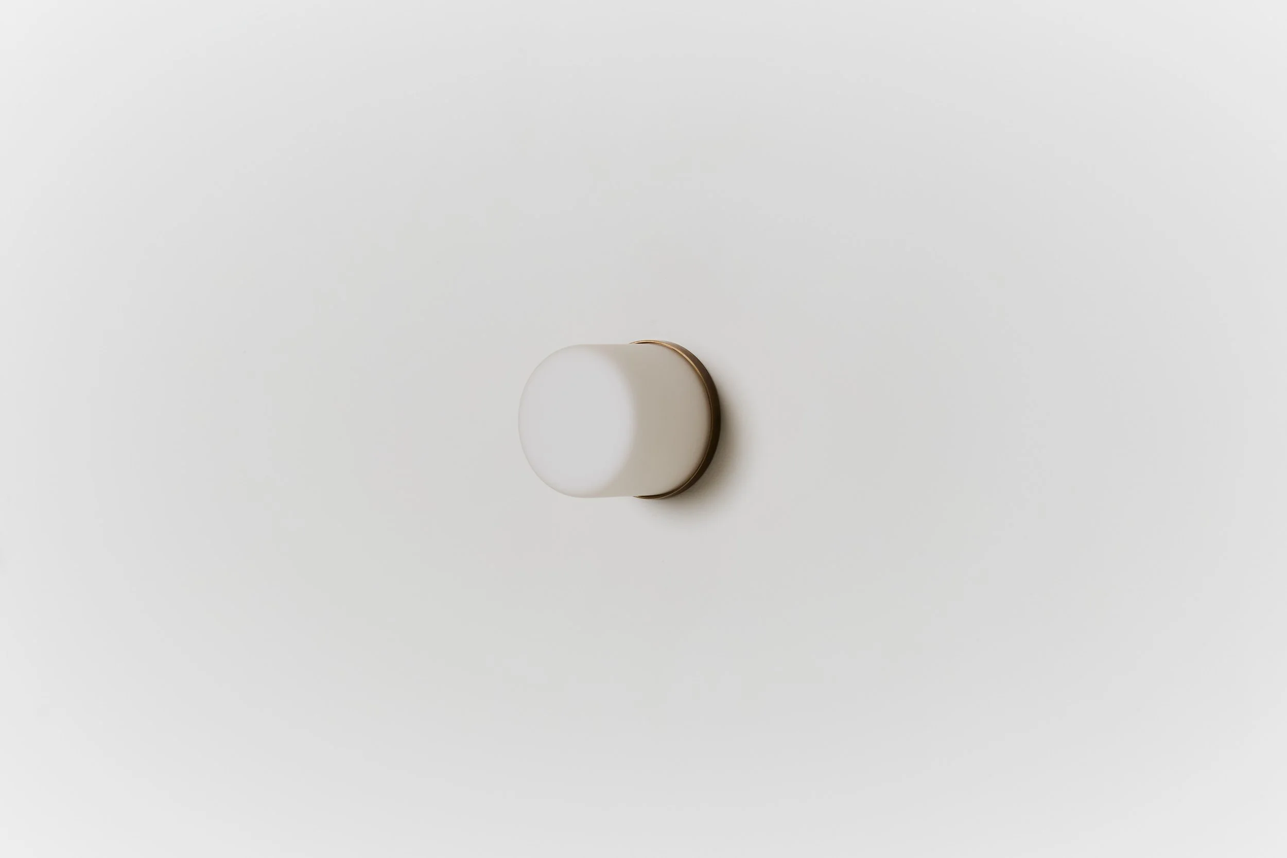 Rider_Nude Large_Aged Brass_Brut White Frosted_Side_Off.jpg