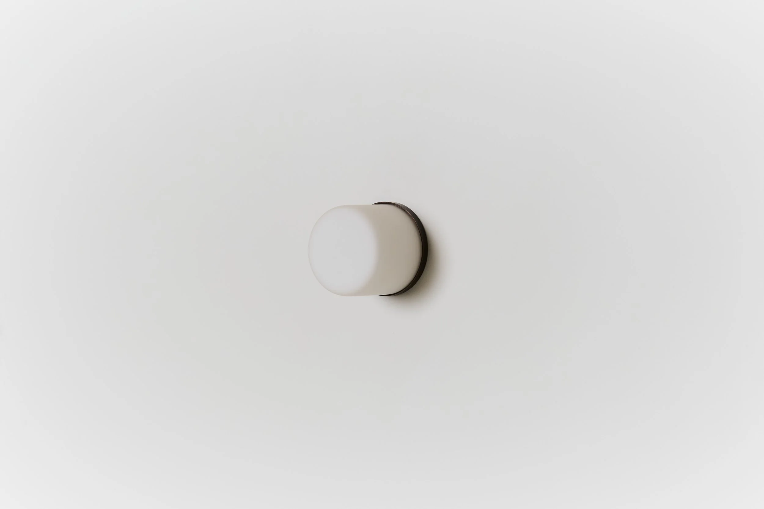Rider_Nude Large_Bronze Patina_Brut White Frosted_Side_Off.jpg