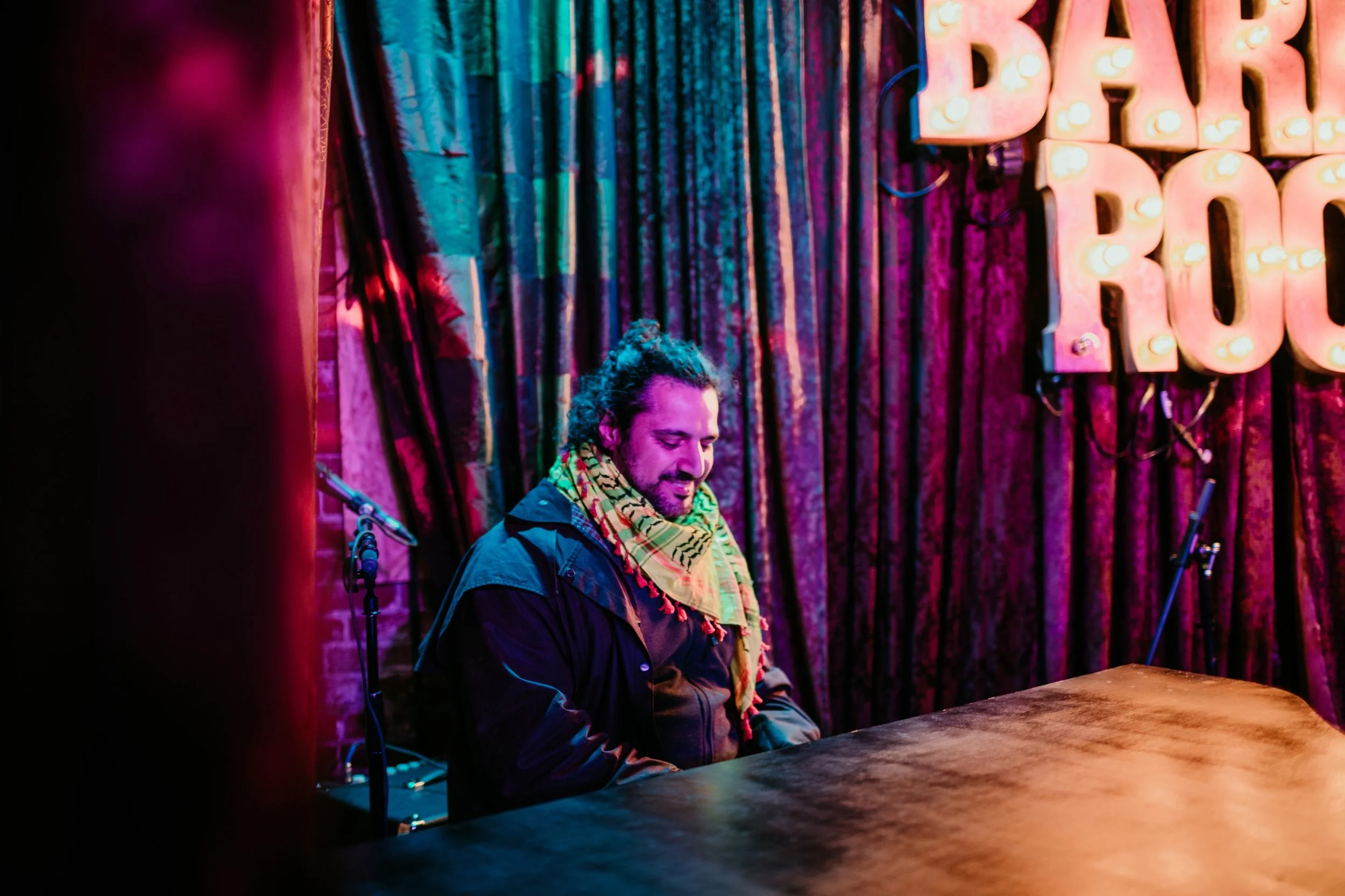 Artisan photography by Kimberly Marie Kimble for the Barrel Room of a musician playing a piano