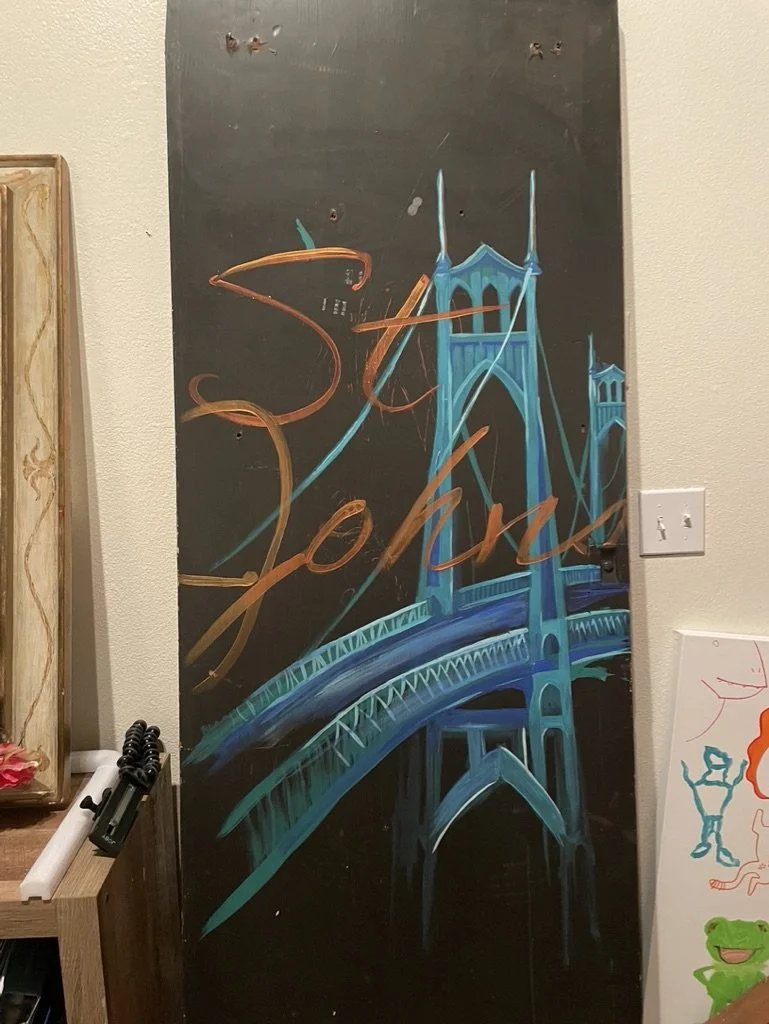 An example of our door decor: St John's bridge painted with the St. Johns in script