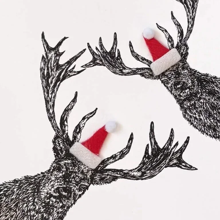 Chirstmas_card_peeping_deers_santa_hat.jpg