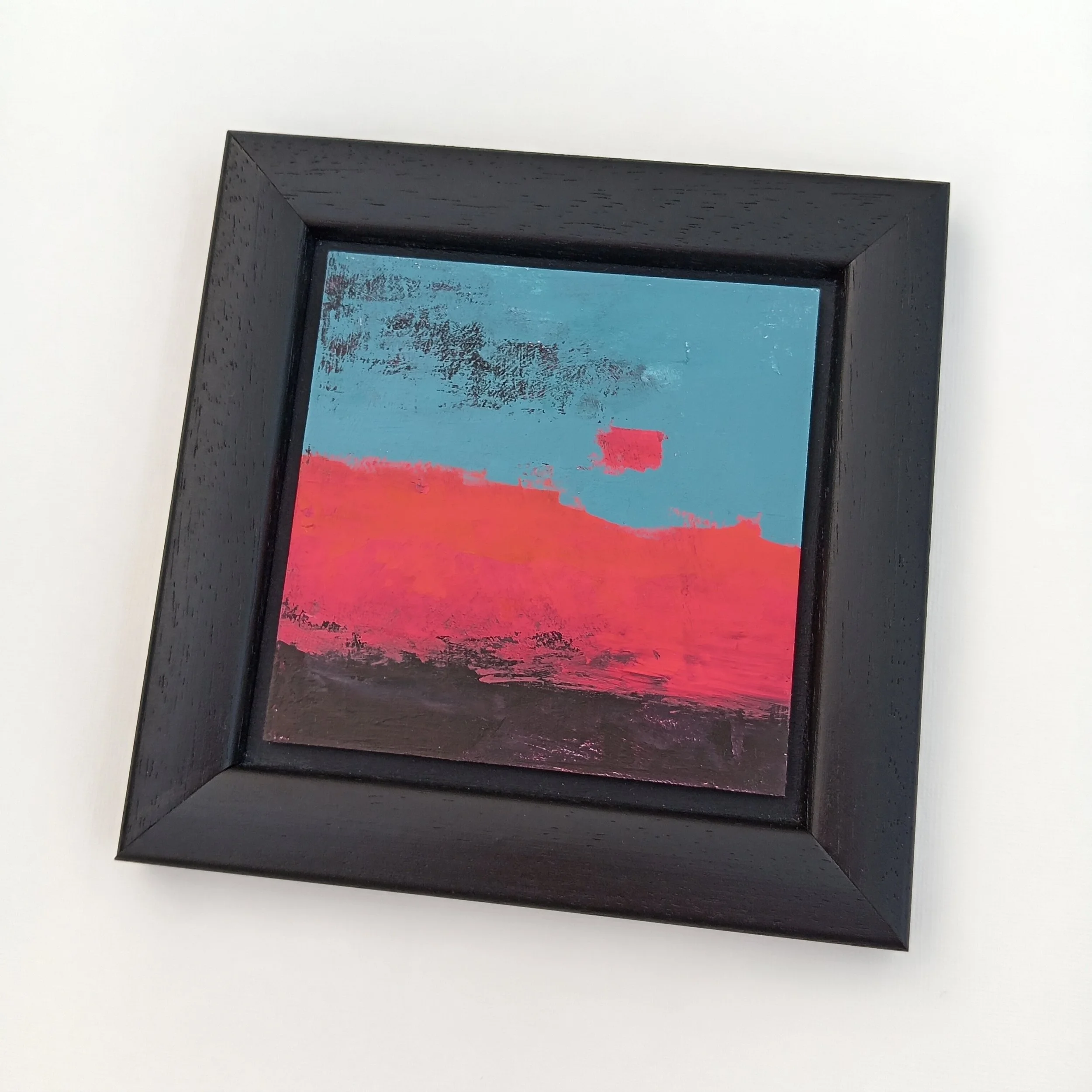 abstract landscape red blue black in frame