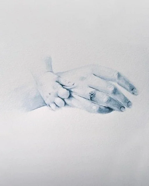 A pencil drawing of an adult hand holding a child's hand.