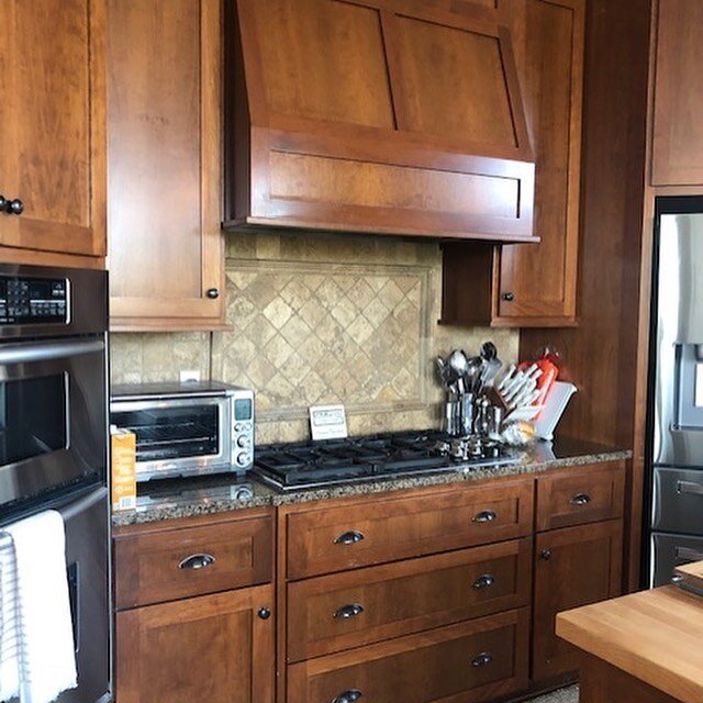These cabinets were in great shape but they just needed to be &ldquo;updated&rdquo; so we sprayed them with a custom white and changed the island to Kendall Charcoal 😎😎😎 now it looks like a brand new kitchen !