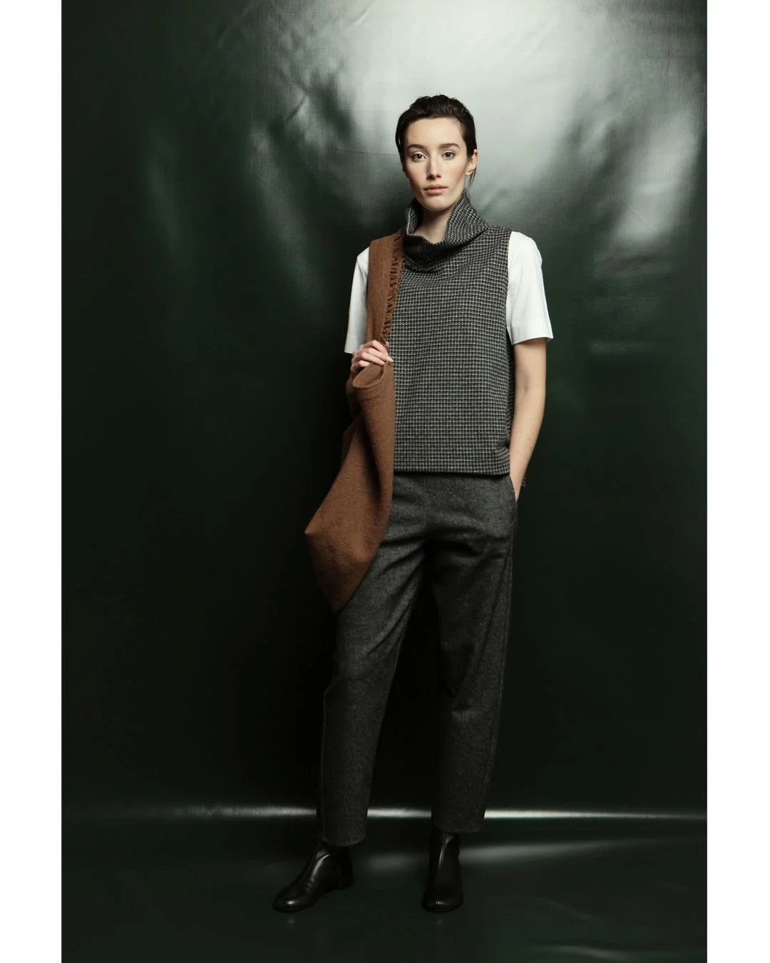 Never underestimate a white T-shirt. Layered it brings ease and a relaxed attitude to every outfit.