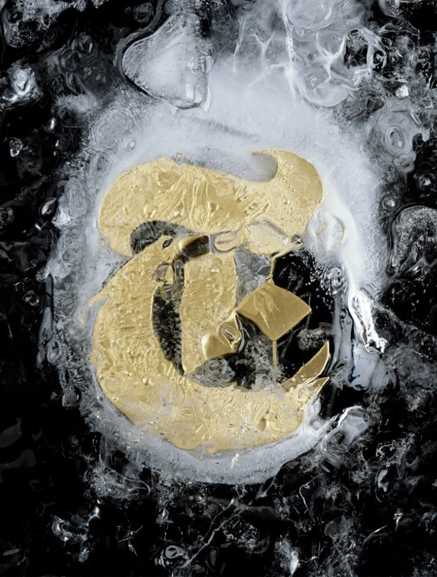 A melting gold Bitcoin symbol in icy water surrounded by ice and bubbles.