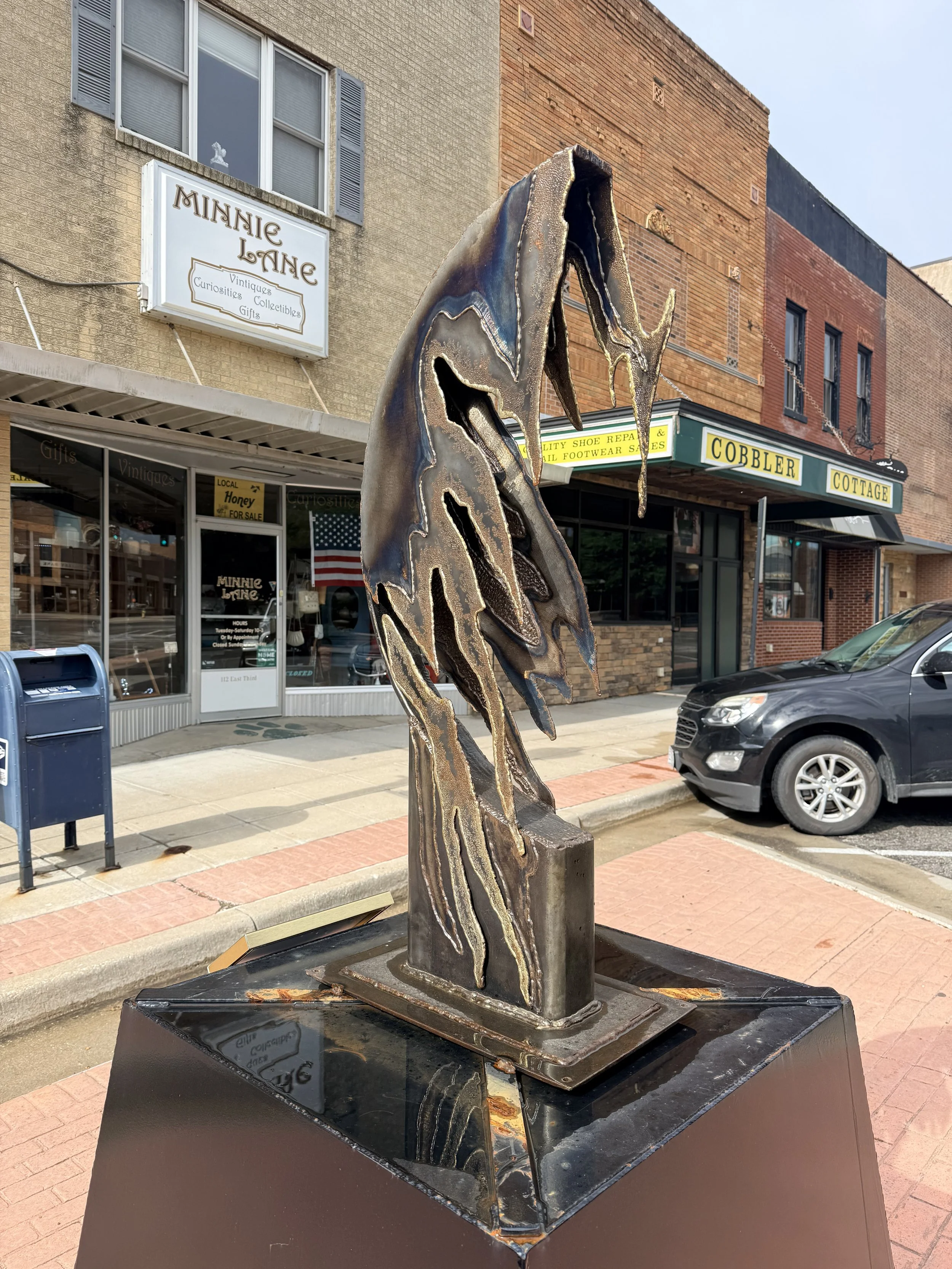 A melted metal looking structure.