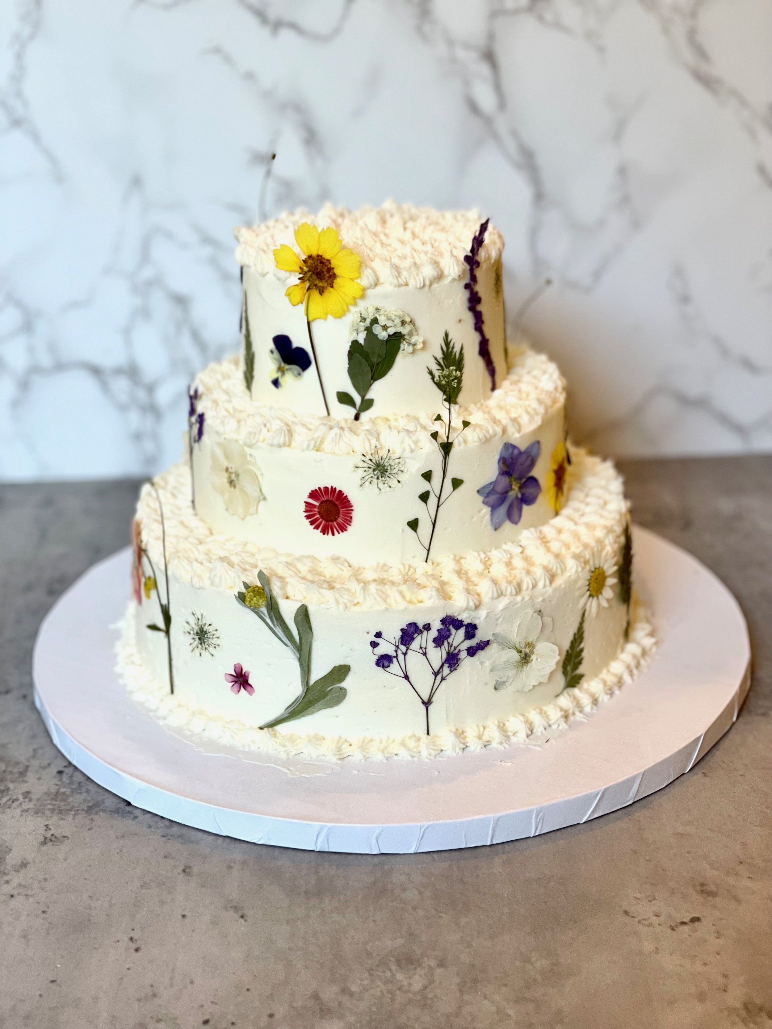 "Cutting Cake" Chai Tea Cake with Vanilla Buttercream and Spiced Apple Filling, Pressed Flowers