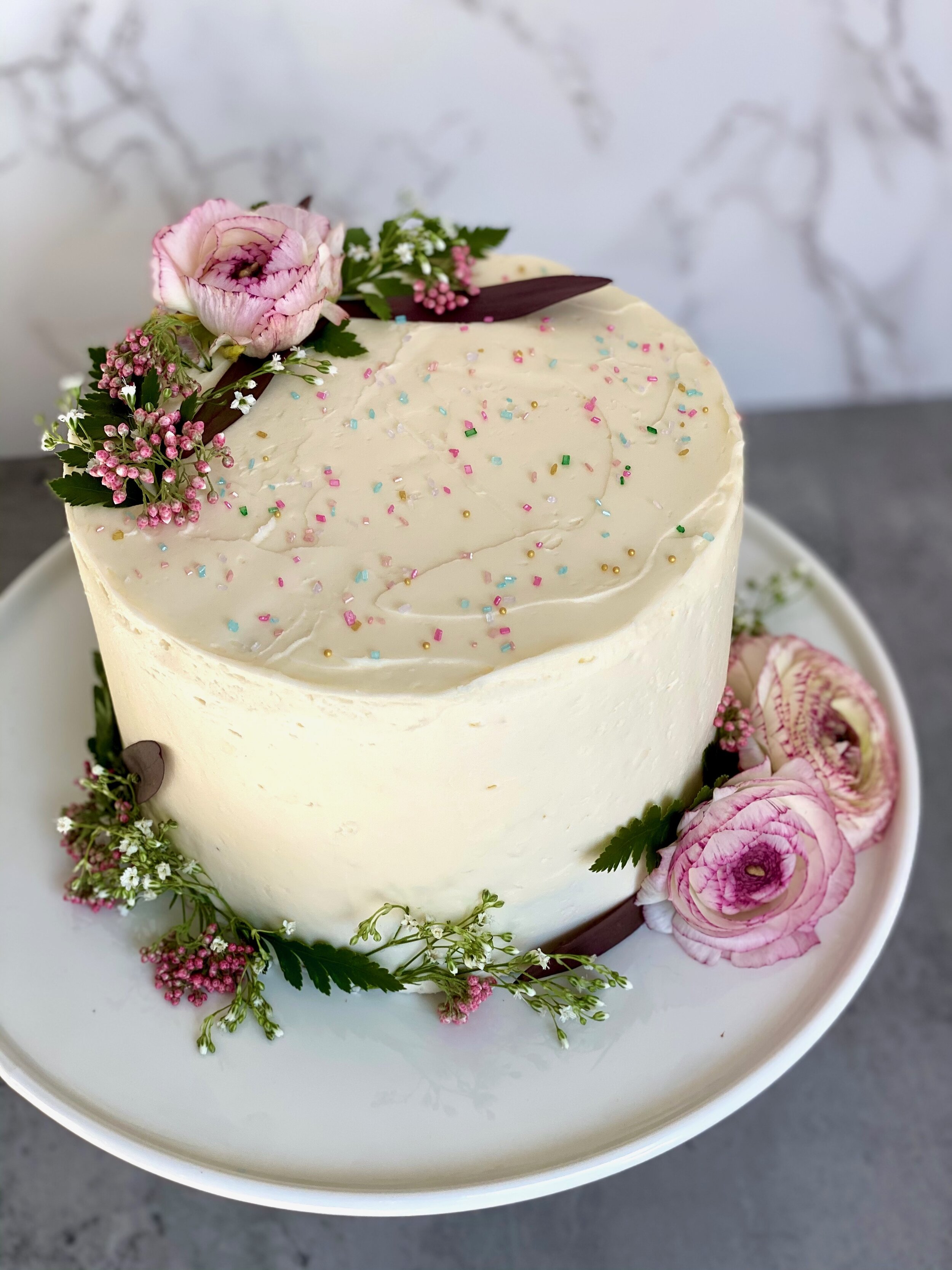 Cherry Chocolate Almond Cake, Cherry Filling, Almond Buttercream - Decorated with Fresh Flowers and Sugar Sprinkles