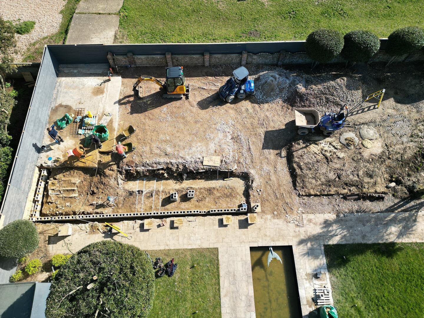 COSTAL PROJECT UPDATE!  Block-work for the terrace retaining walls starting to go in while dodging the rain!  #concrete #footing #blockwork #groundworks #builder #landscaping #landscapedesign #garden #gardendeesign #jlruralcontractors #contractor #bu