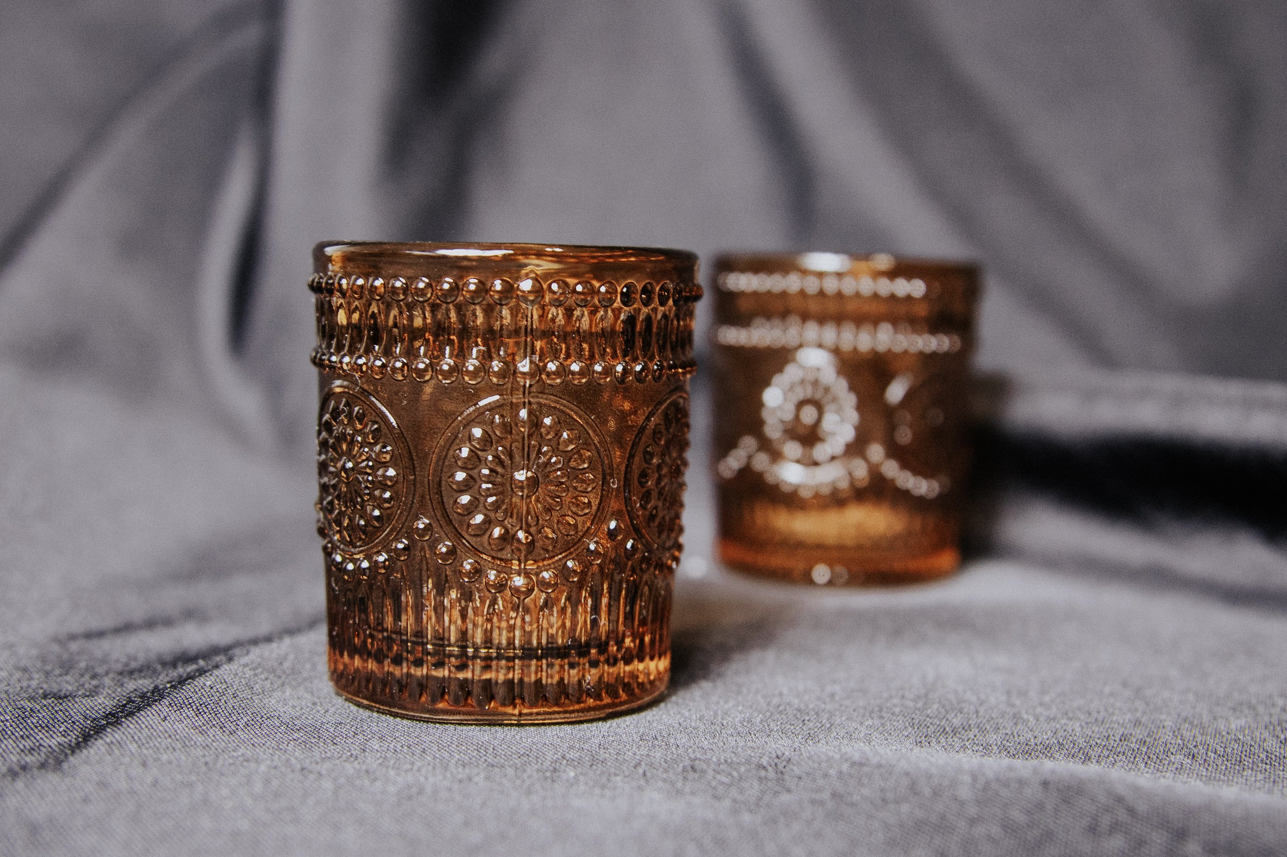 Amber glass candle holder